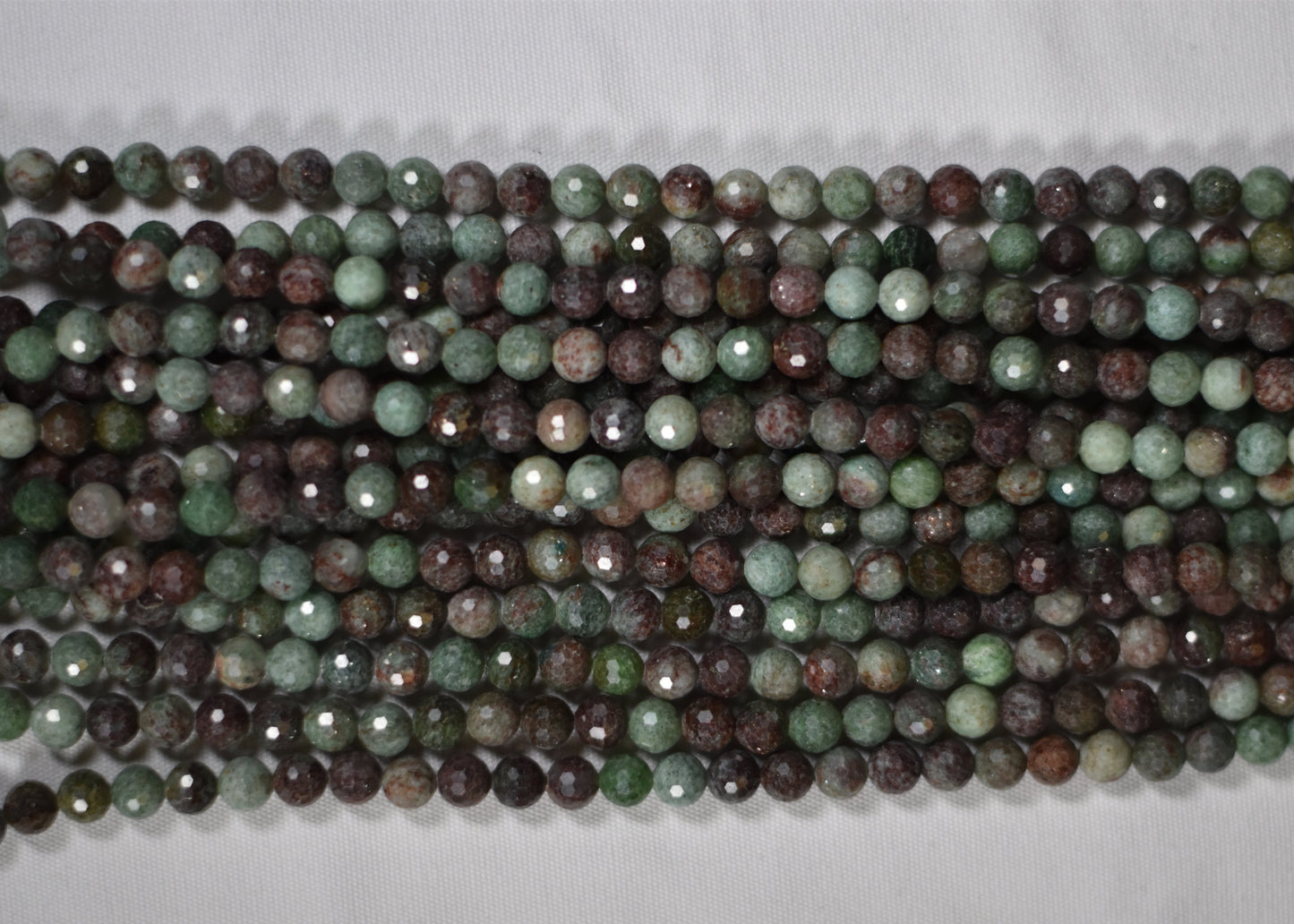 Crafting supplies such as Green Opal Beads available at wholesale and retail prices, only at our crystal shop in San Diego!