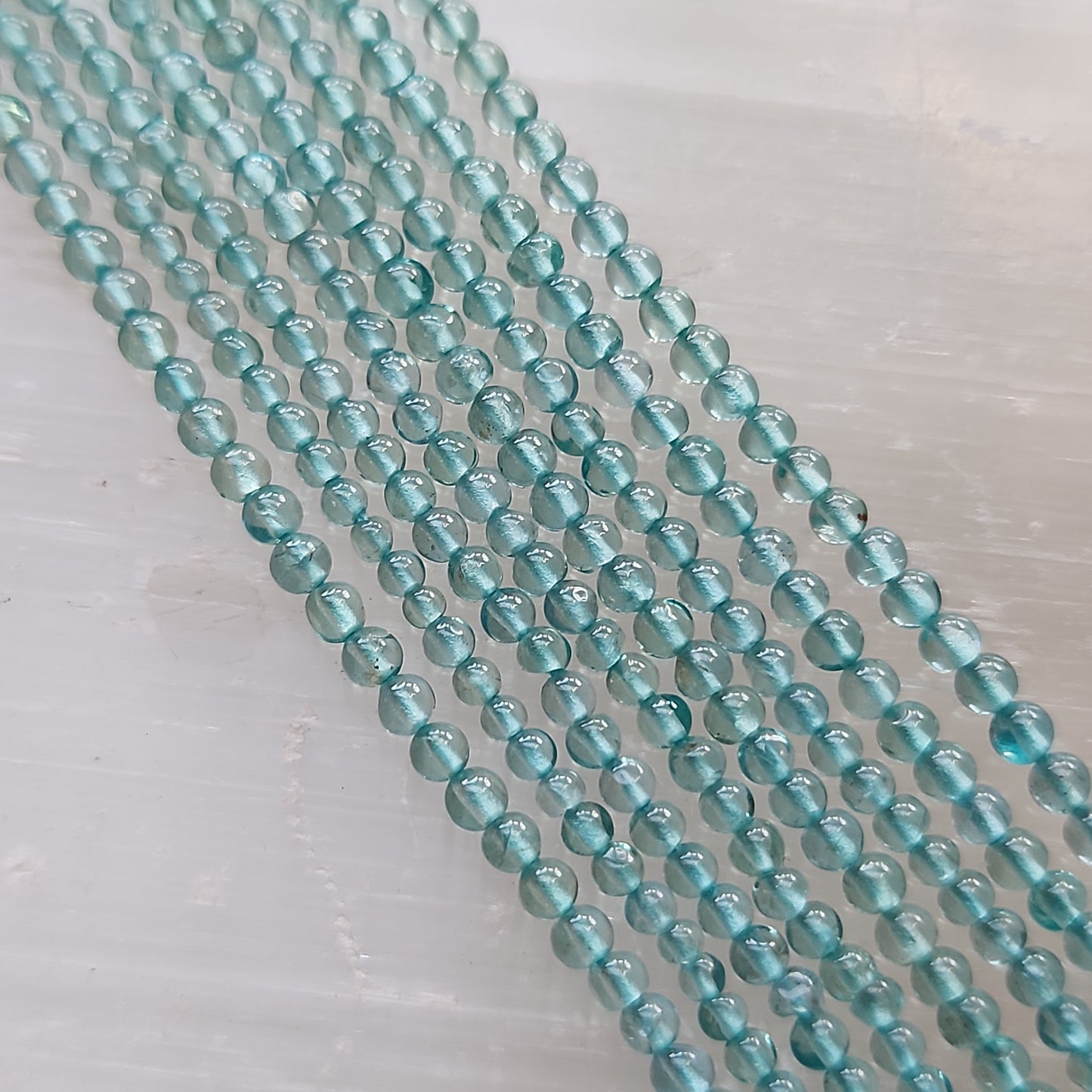 Crafting supplies such as neon apatite beads available at wholesale and retail prices, only at our crystal shop in San Diego