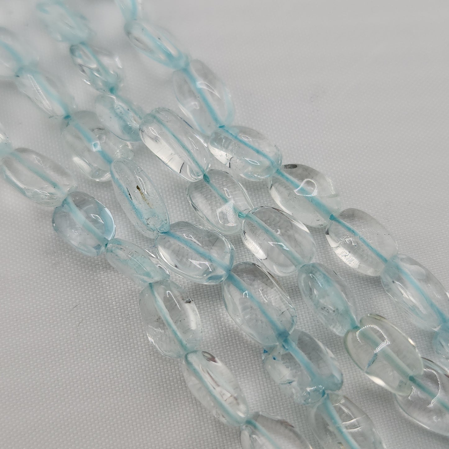 Crafting supplies such as aquamarine beads available at wholesale and retail prices, only at our crystal shop in San Diego!