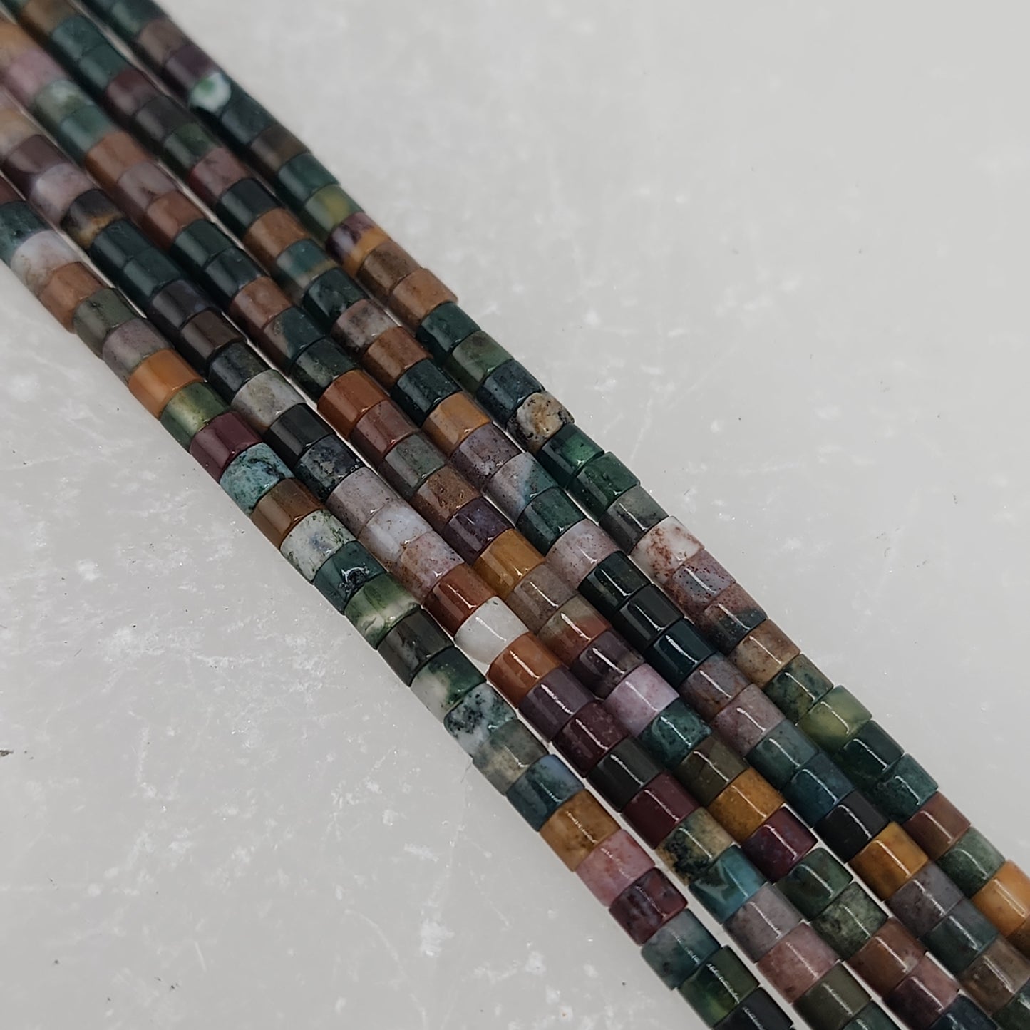 Crafting supplies such as Indian agate heishi beads available at wholesale and retail prices, only at our crystal shop in San Diego!