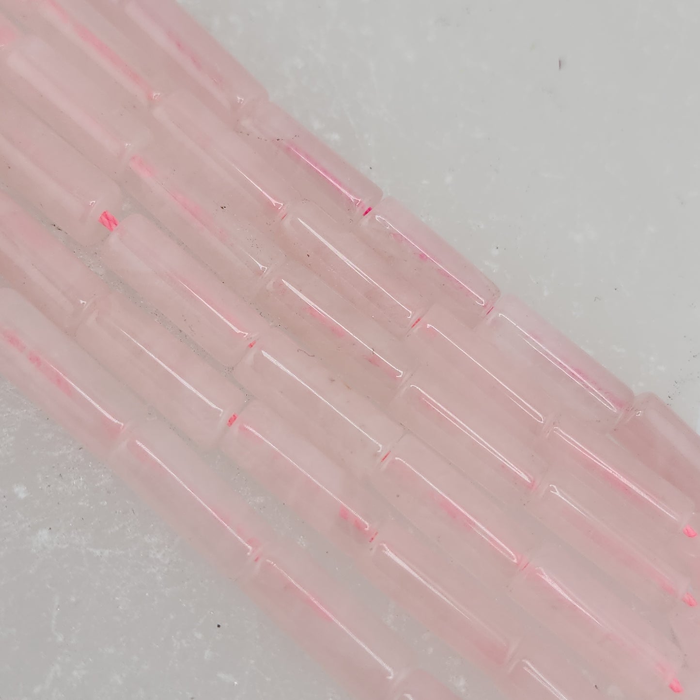 Crafting supplies such as rose quartz tube beads available at wholesale and retail prices, only at our crystal shop in San Diego!