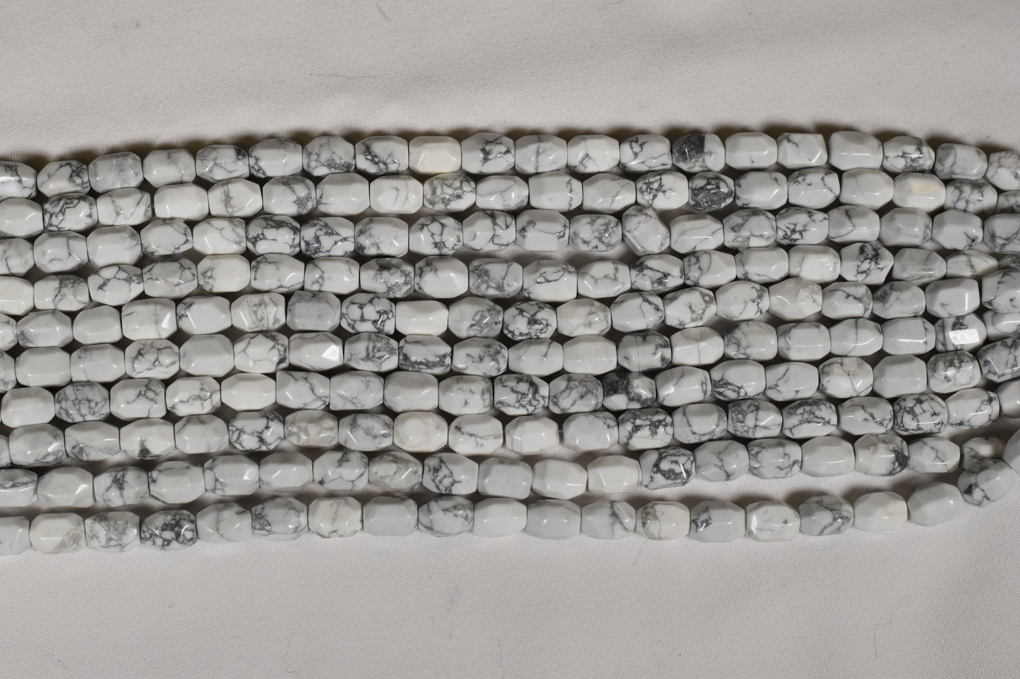 Crafting supplies such as Howlite Beads available at wholesale and retail prices, only at our crystal shop in San Diego!