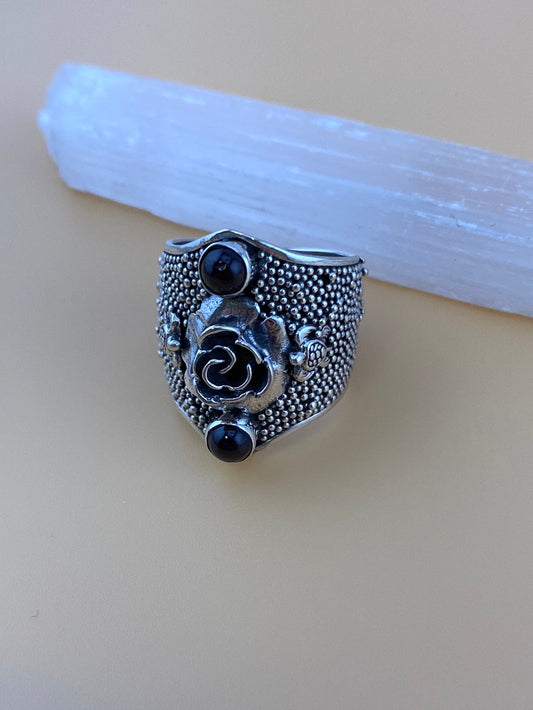 Sterling silver garnet rose ring designed by Shlomo available at wholesale and retail prices, only at our crystal shop in San Diego!