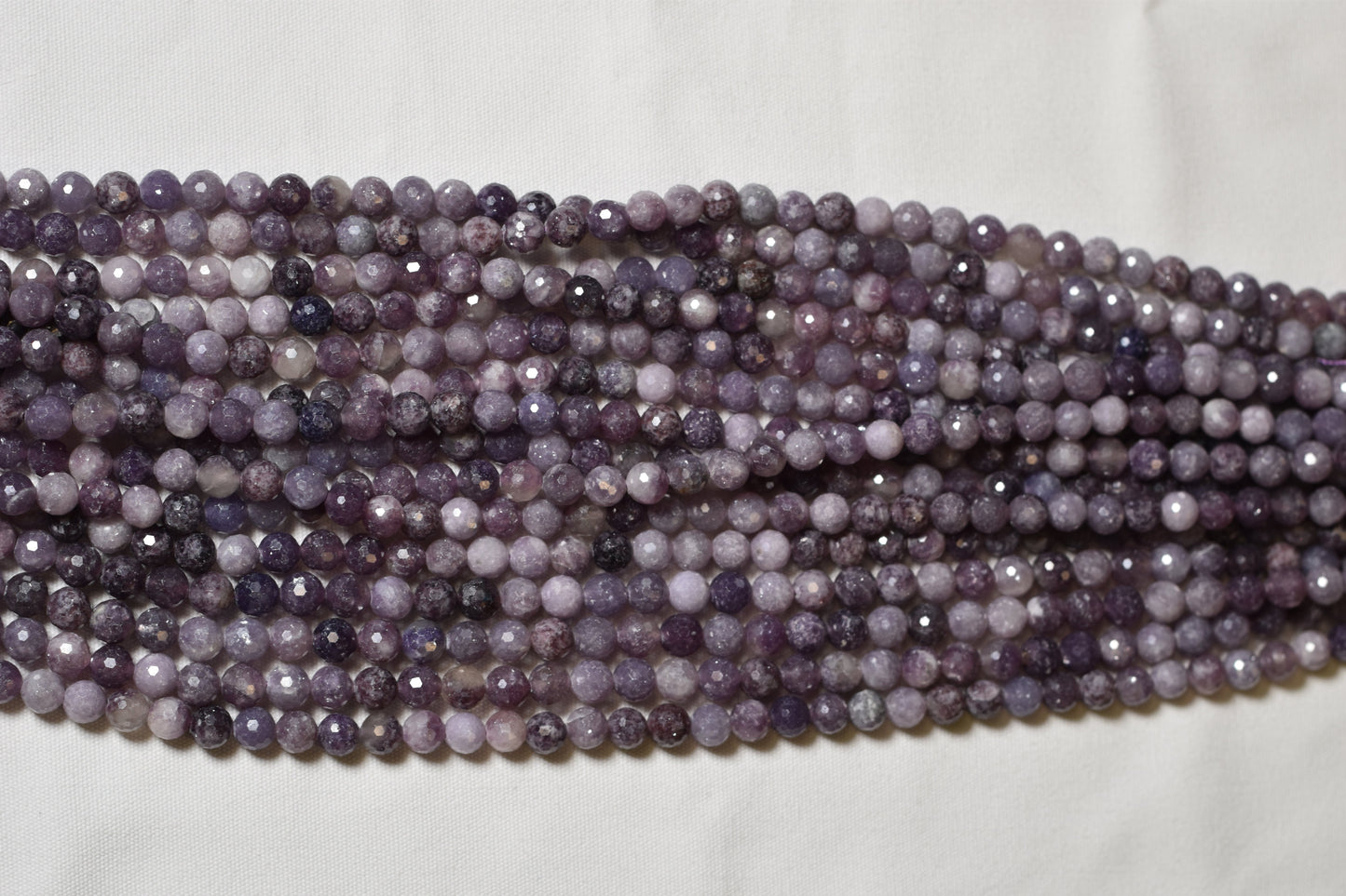 Crafting supplies such as Lepidolite Beads available at wholesale and retail prices, only at our crystal shop in San Diego!