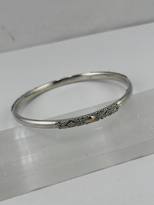 Sterling silver and 18k gold Bali bangle available at wholesale and retail prices, only at our crystal shop in San Diego!