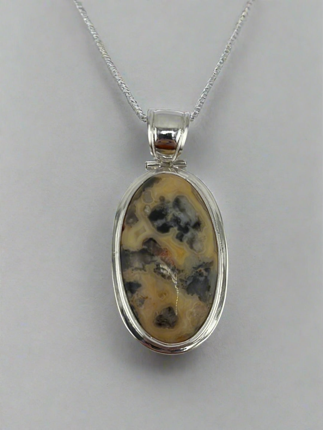 S.S. Crazy Lace Agate Pendants