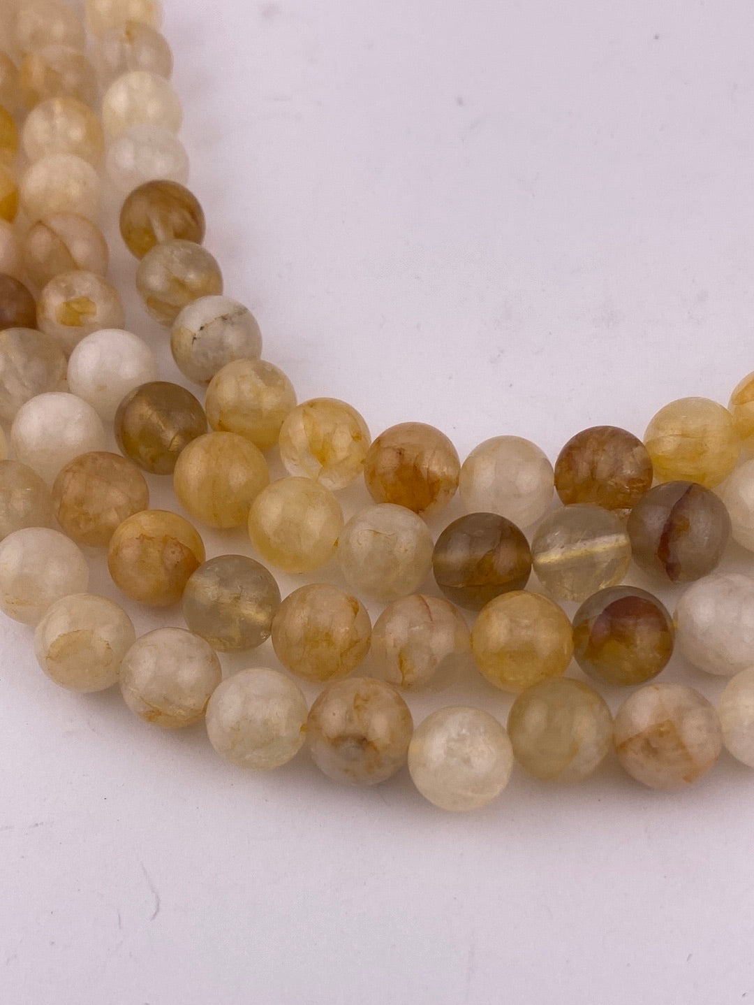 Crafting supplies such as golden healer beads available at wholesale and retail prices, only at our crystal shop in San Diego!