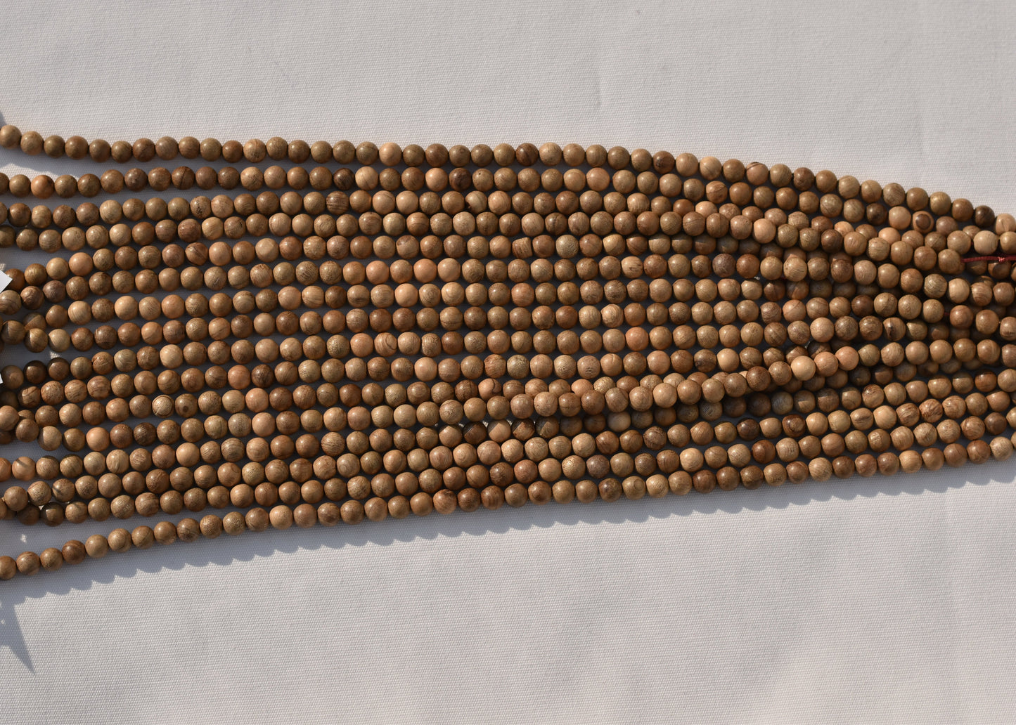 Crafting supplies such as Wood Beads available at wholesale and retail prices, only at our crystal shop in San Diego!
