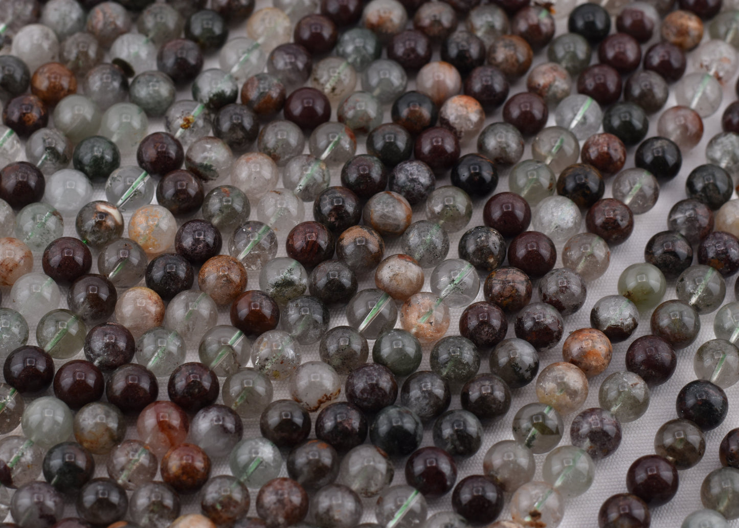 Crafting supplies such as Phantom Quartz Beads available at wholesale and retail prices, only at our crystal shop in San Diego!