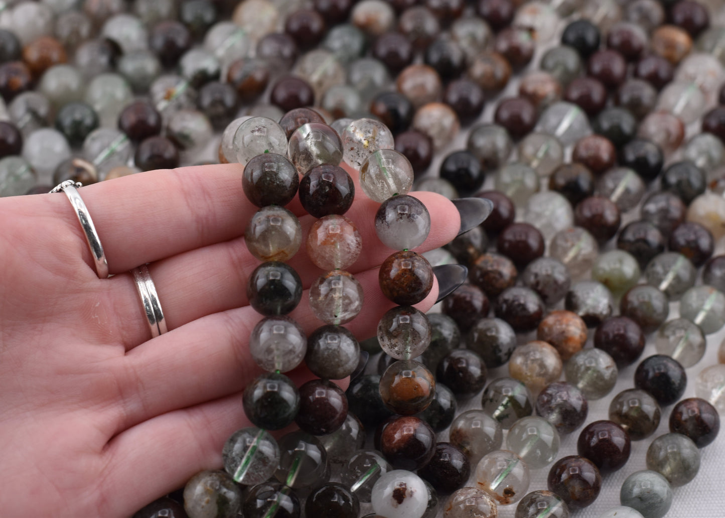Crafting supplies such as Phantom Quartz Beads available at wholesale and retail prices, only at our crystal shop in San Diego!