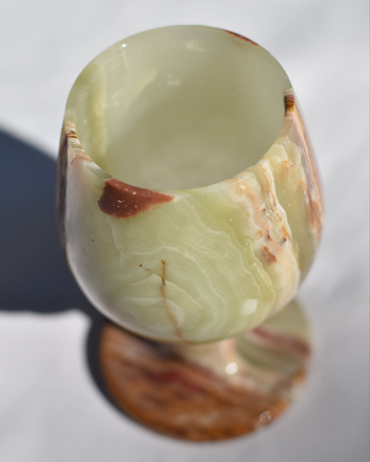 Check out our crystal shop in San Diego with green onyx decor such as lamps, bowls, candle holders and more!
At Pacific Beads, we carry stones in a wide variety of forms. Find green onyx geodes, green onyx housewares, green onyx carvings, and designer green onyx jewelry so that you can enjoy its healing properties in the way that best suits you and your lifestyle. The best part? You can shop crystals wholesale, meaning there is always something within your budget!