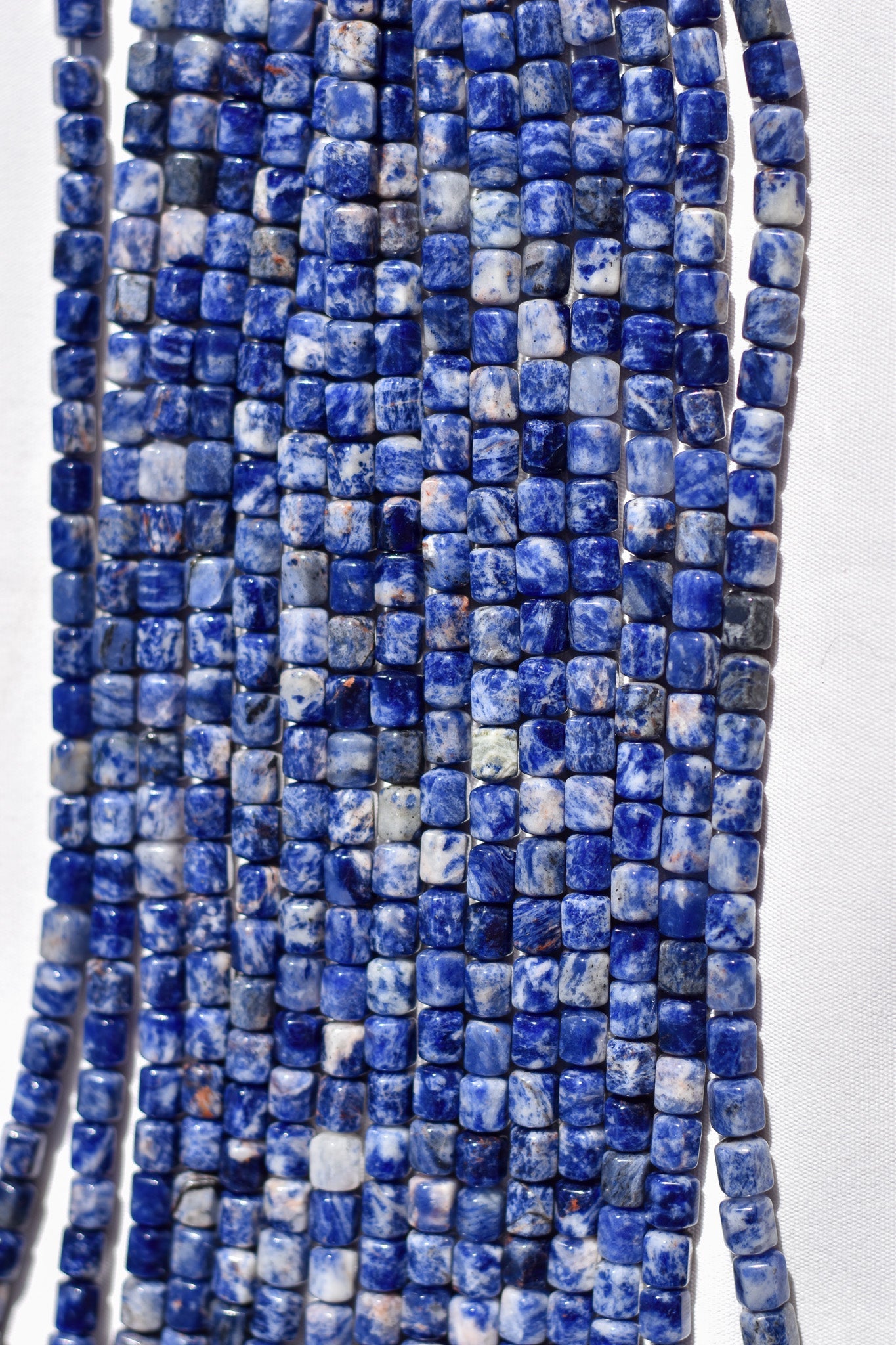 Check out our crystal shop in San Diego with Sodalite beads and findings in sterling silver, gold, and more!
At Pacific Beads, we carry crystals in a wide variety of forms. Find Sodalite beads, Sodalite geodes, Sodalite carvings, and designer Sodalite jewelry so that you can enjoy its healing properties in the way that best suits you and your lifestyle. The best part? You can shop crystals wholesale, meaning there is always something within your budget!