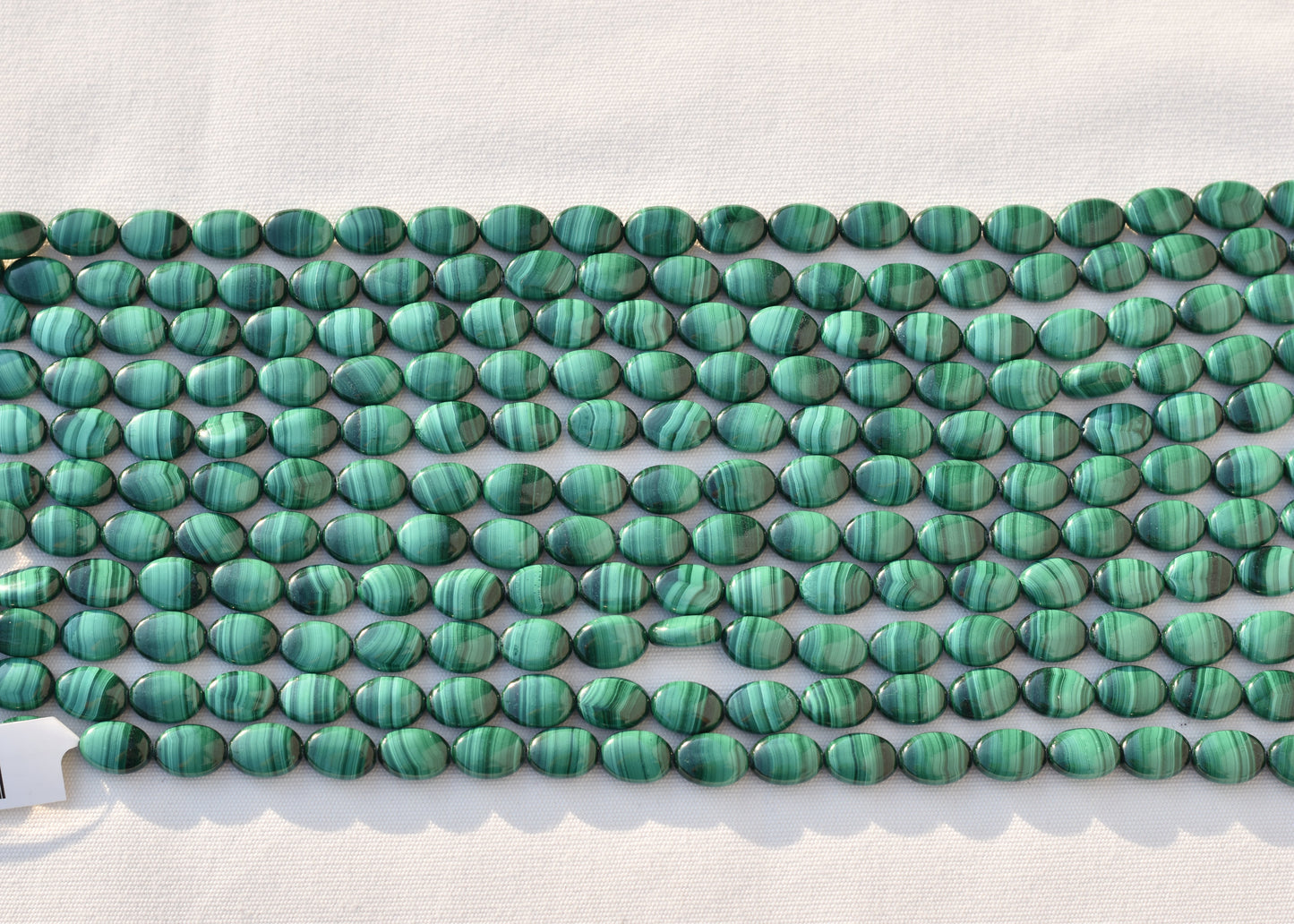 Crafting supplies such as Malachite Beads available at wholesale and retail prices, only at our crystal shop in San Diego!