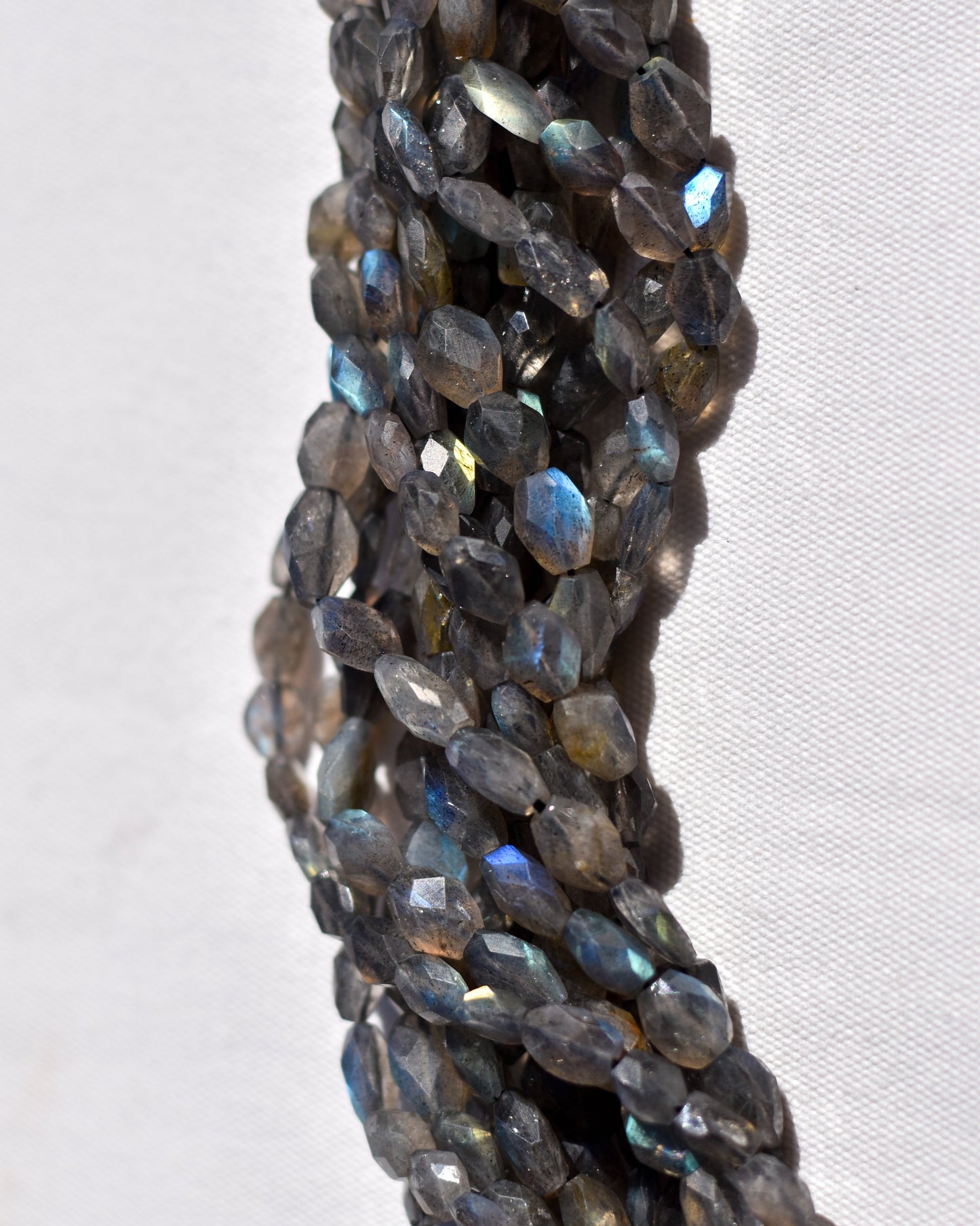 Check out our crystal shop in San Diego with Labradorite beads and findings in sterling silver, gold, and more!
At Pacific Beads, we carry crystals in a wide variety of forms. Find Labradorite beads, Labradorite geodes, Labradorite carvings, and designer Labradorite jewelry so that you can enjoy its healing properties in the way that best suits you and your lifestyle. The best part? You can shop crystals wholesale, meaning there is always something within your budget!