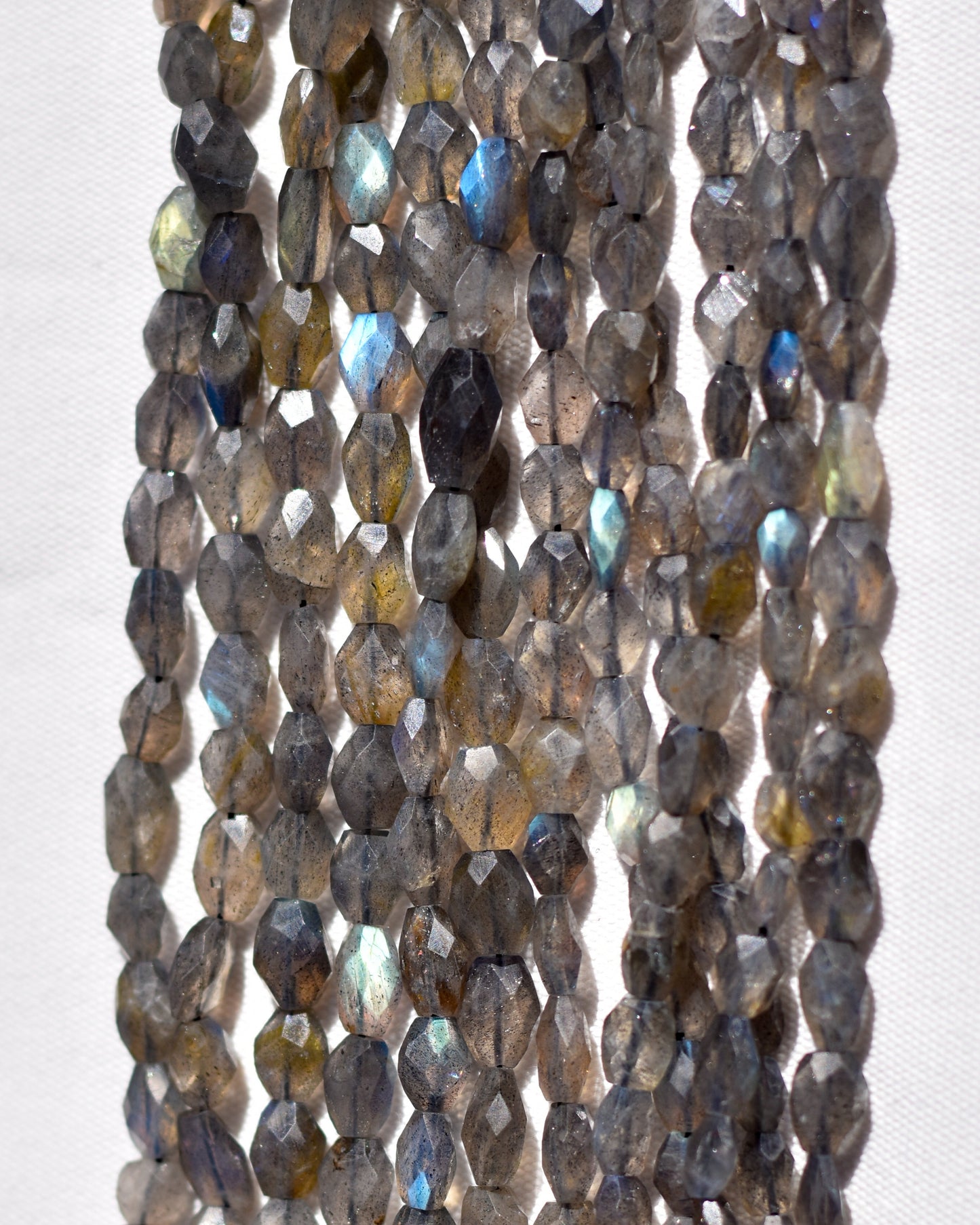 Check out our crystal shop in San Diego with Labradorite beads and findings in sterling silver, gold, and more!
At Pacific Beads, we carry crystals in a wide variety of forms. Find Labradorite beads, Labradorite geodes, Labradorite carvings, and designer Labradorite jewelry so that you can enjoy its healing properties in the way that best suits you and your lifestyle. The best part? You can shop crystals wholesale, meaning there is always something within your budget!