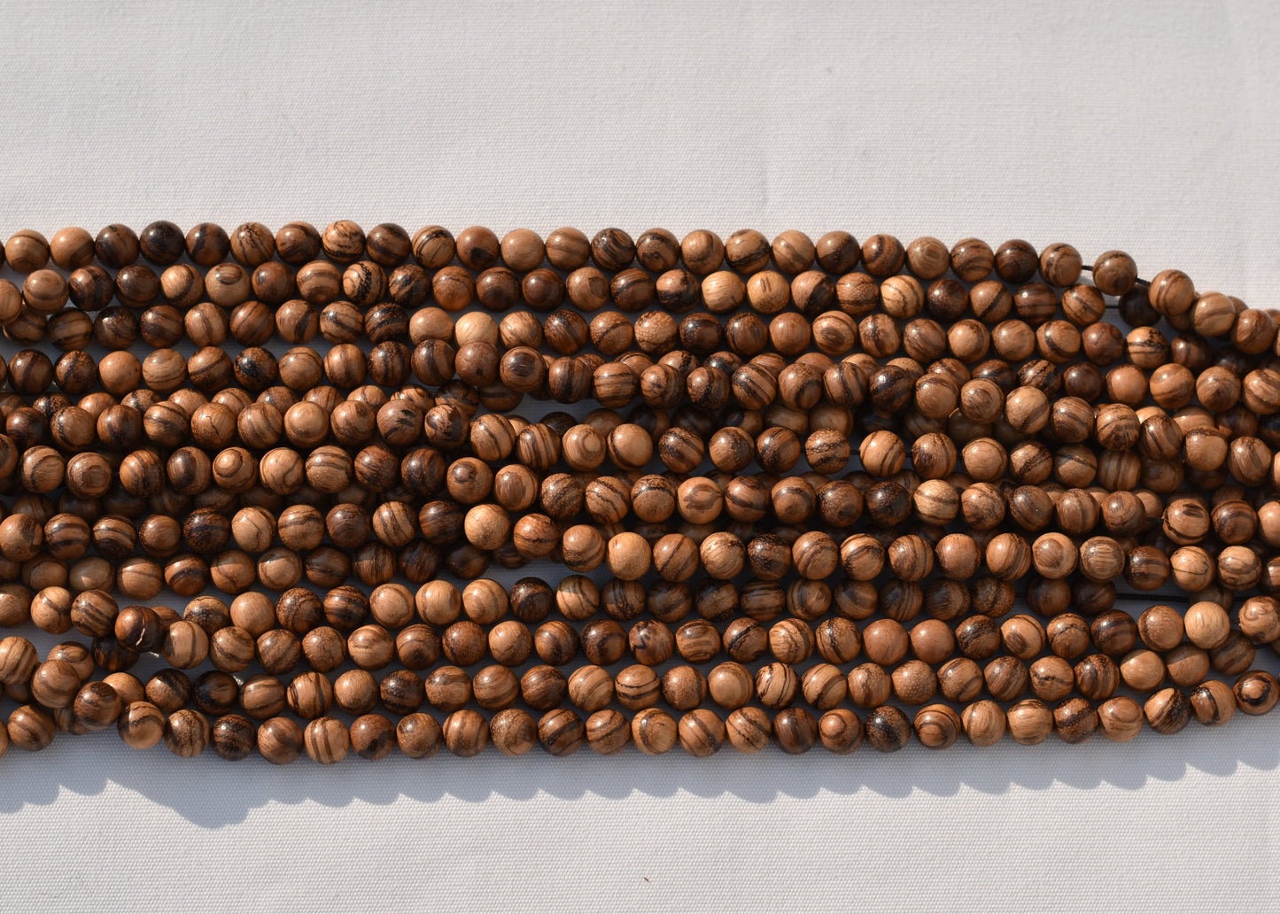 Crafting supplies such as Wood Beads available at wholesale and retail prices, only at our crystal shop in San Diego!