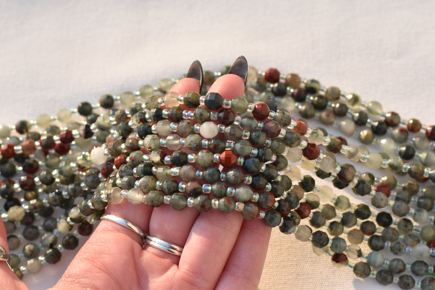 Crafting supplies such as Bloodstone Beads available at wholesale and retail prices, only at our crystal shop in San Diego!