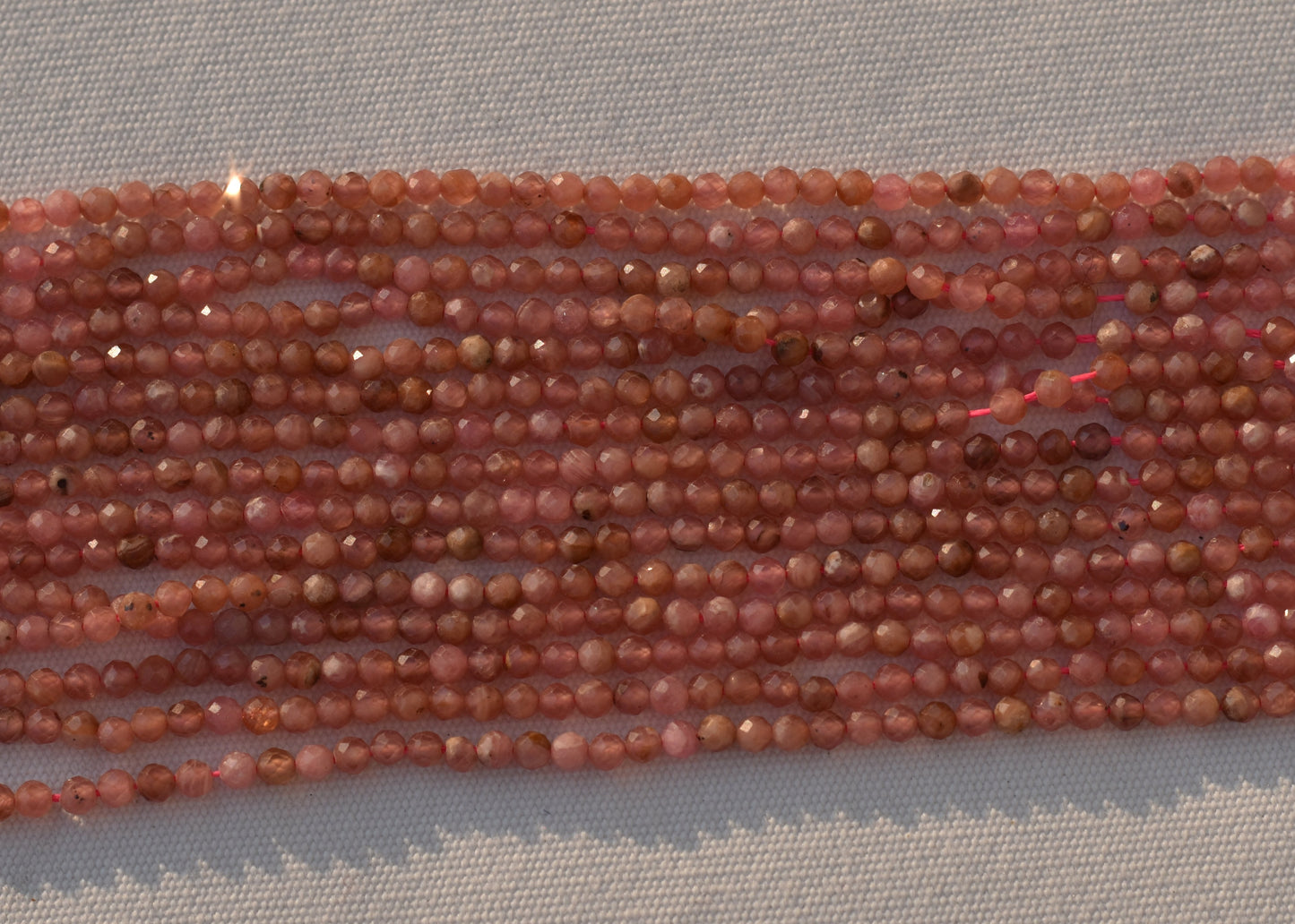 Crafting supplies such as Rhodochrosite Beads available at wholesale and retail prices, only at our crystal shop in San Diego!