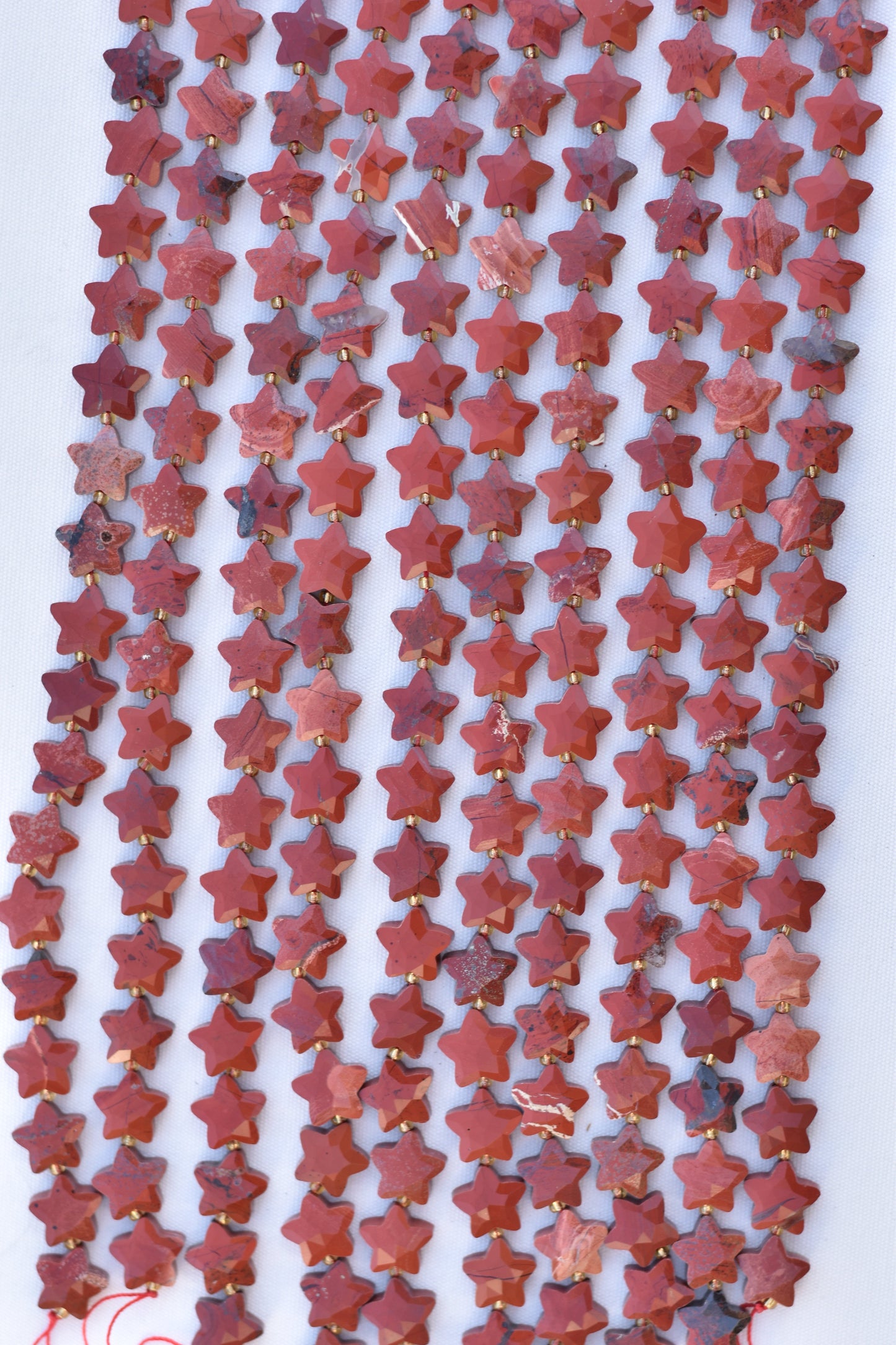 Check out our crystal shop in San Diego with red jasper beads and findings in sterling silver, gold, and more!
At Pacific Beads, we carry stones in a wide variety of forms. Find red jasper beads, red jasper carvings, and designer red jasper jewelry so that you can enjoy its healing properties in the way that best suits you and your lifestyle. The best part? You can shop crystals wholesale, meaning there is always something within your budget!