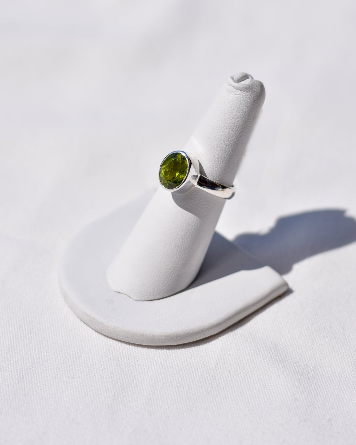 S.S. Faceted Oval Peridot Rings