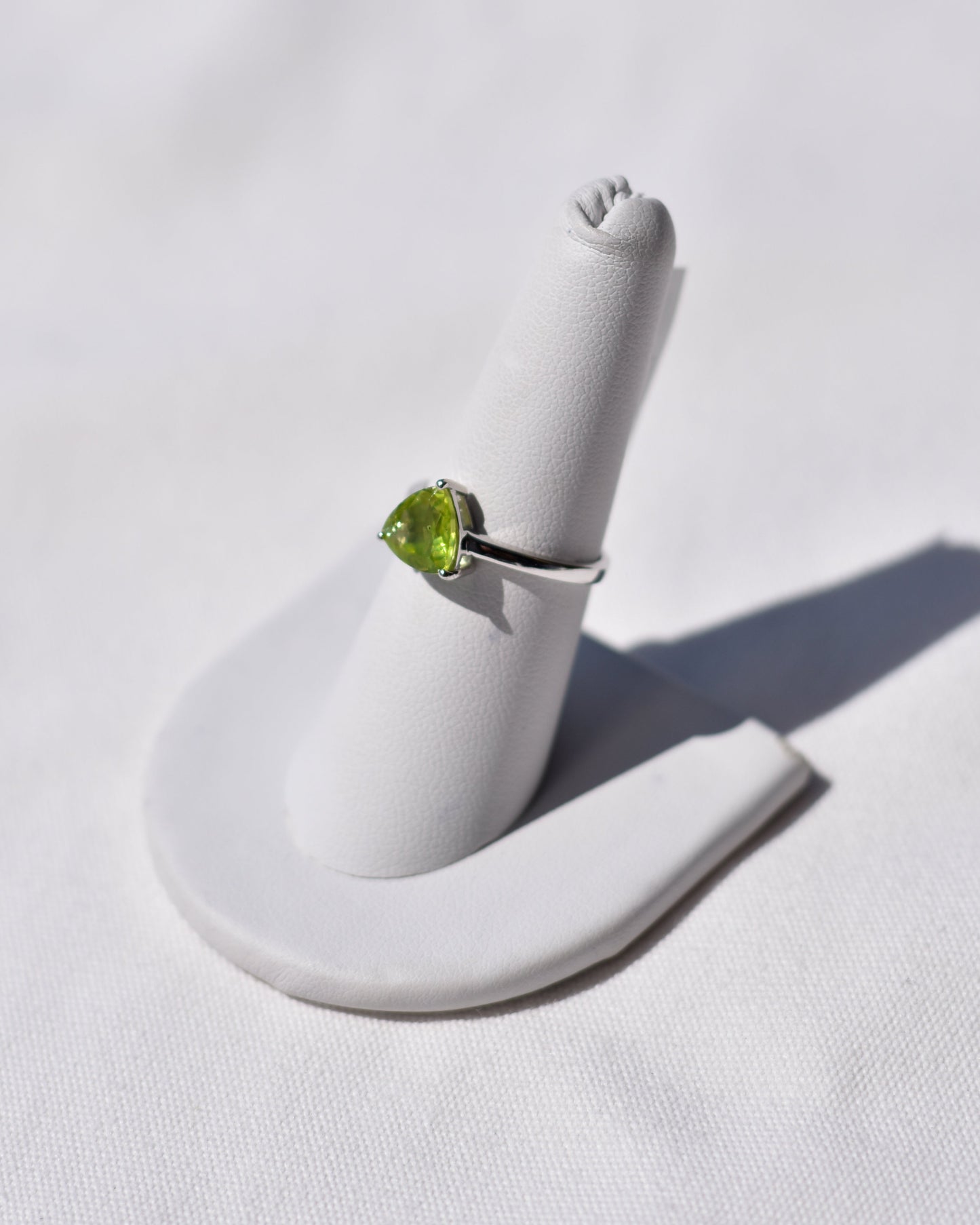 S.S. Faceted Triangle Peridot Rings