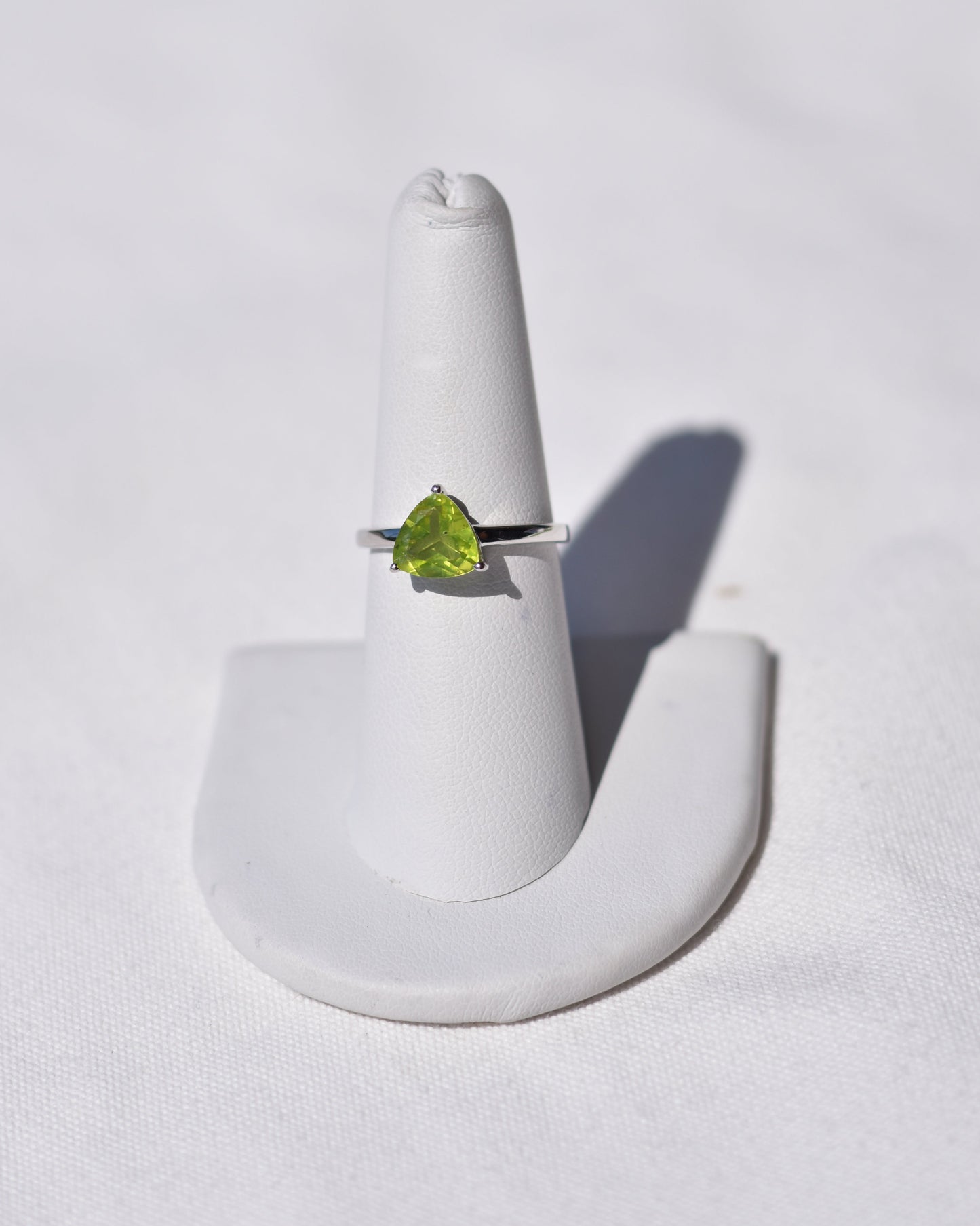 S.S. Faceted Triangle Peridot Rings