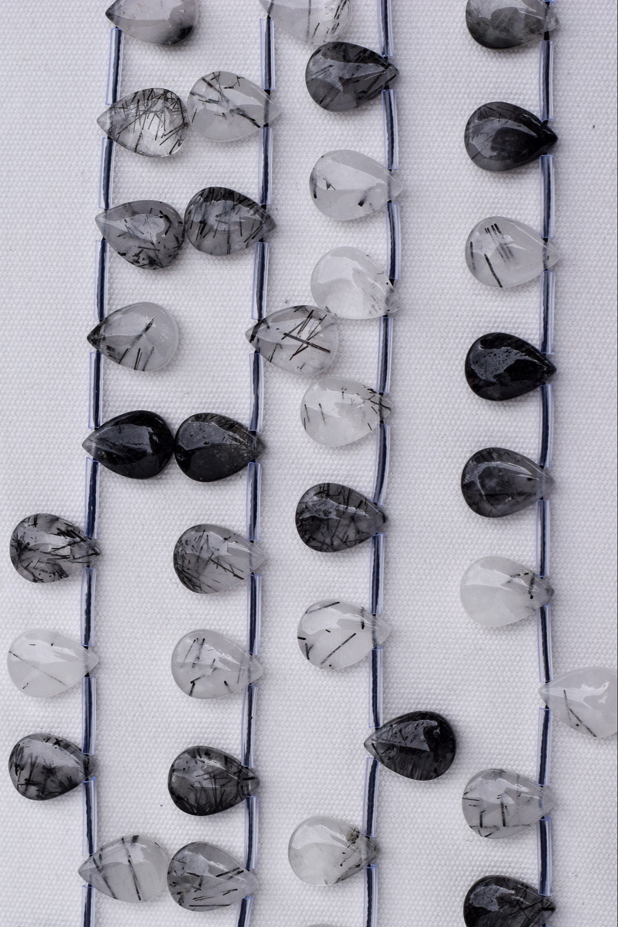 Crafting supplies such as Black Rutilated Quartz Beads available at wholesale and retail prices, only at our crystal shop in San Diego!