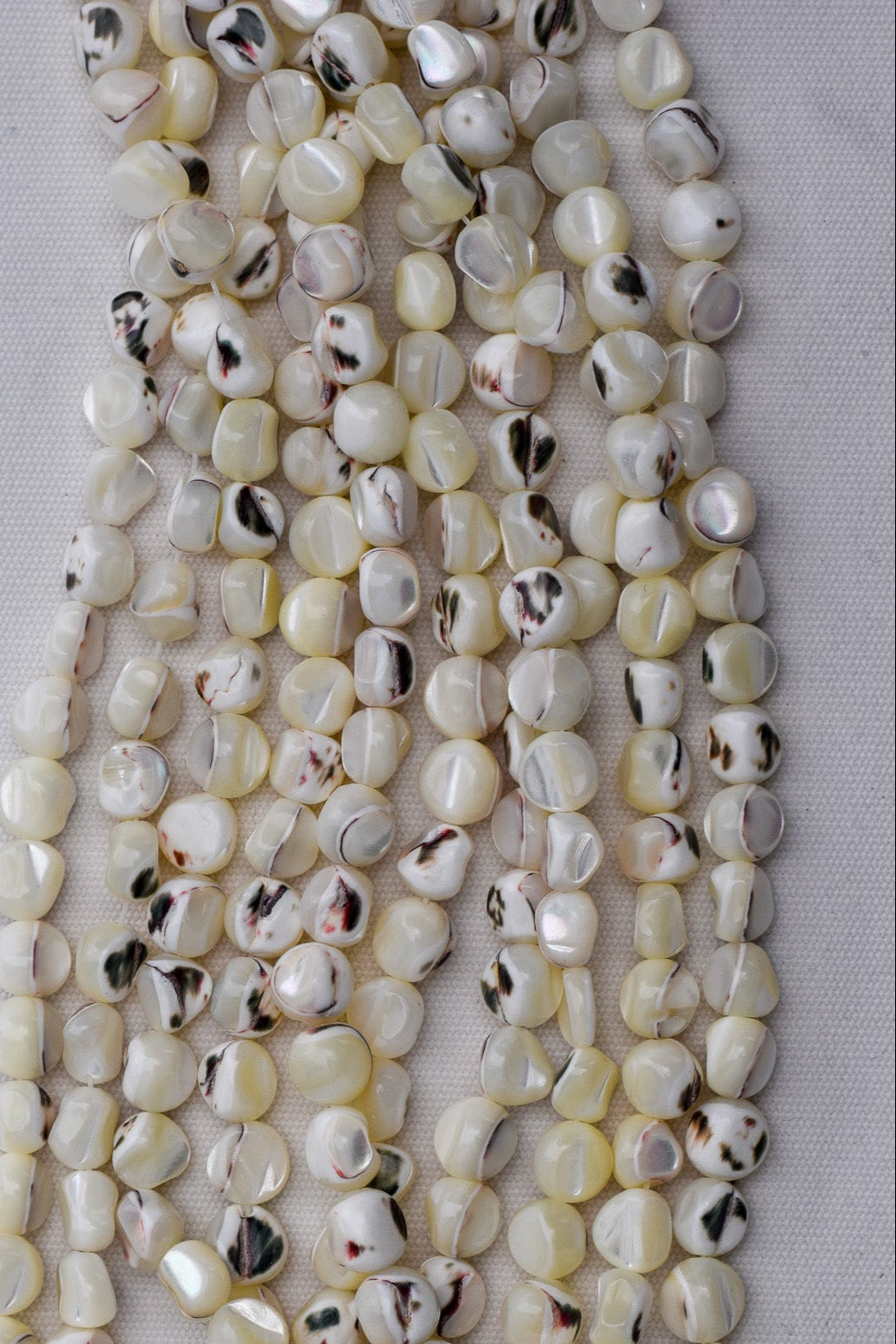 Crafting supplies such as Mother of Pearl Beads available at wholesale and retail prices, only at our crystal shop in San Diego!