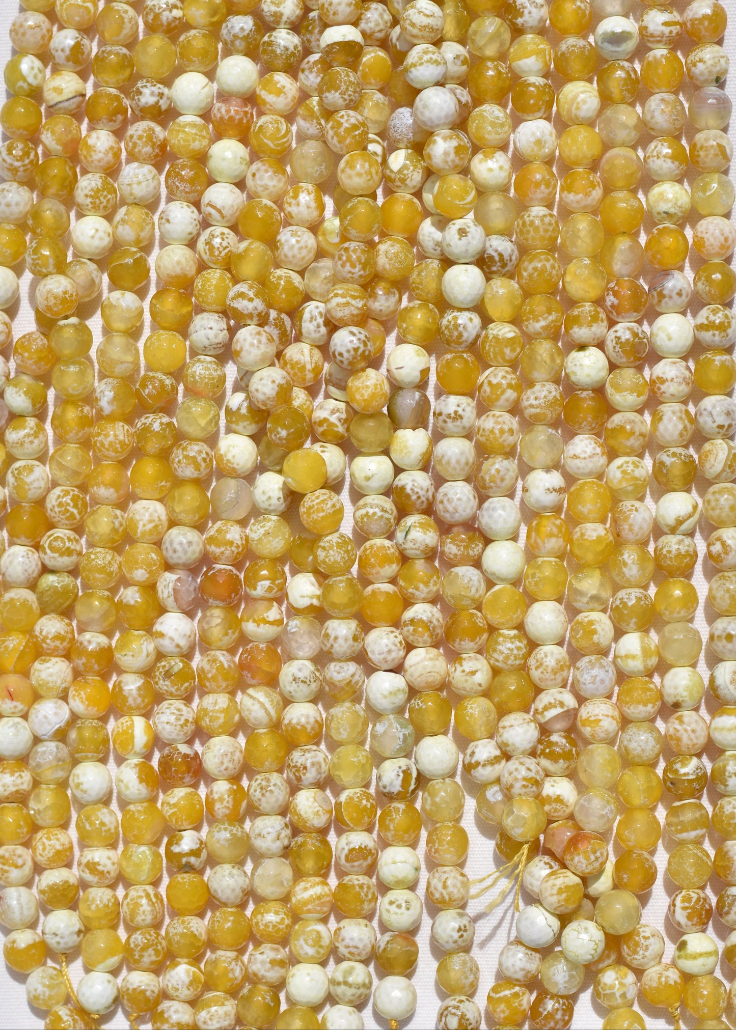 Crafting supplies such as Fire Agate beads available at wholesale and retail prices, only at our crystal shop in San Diego!