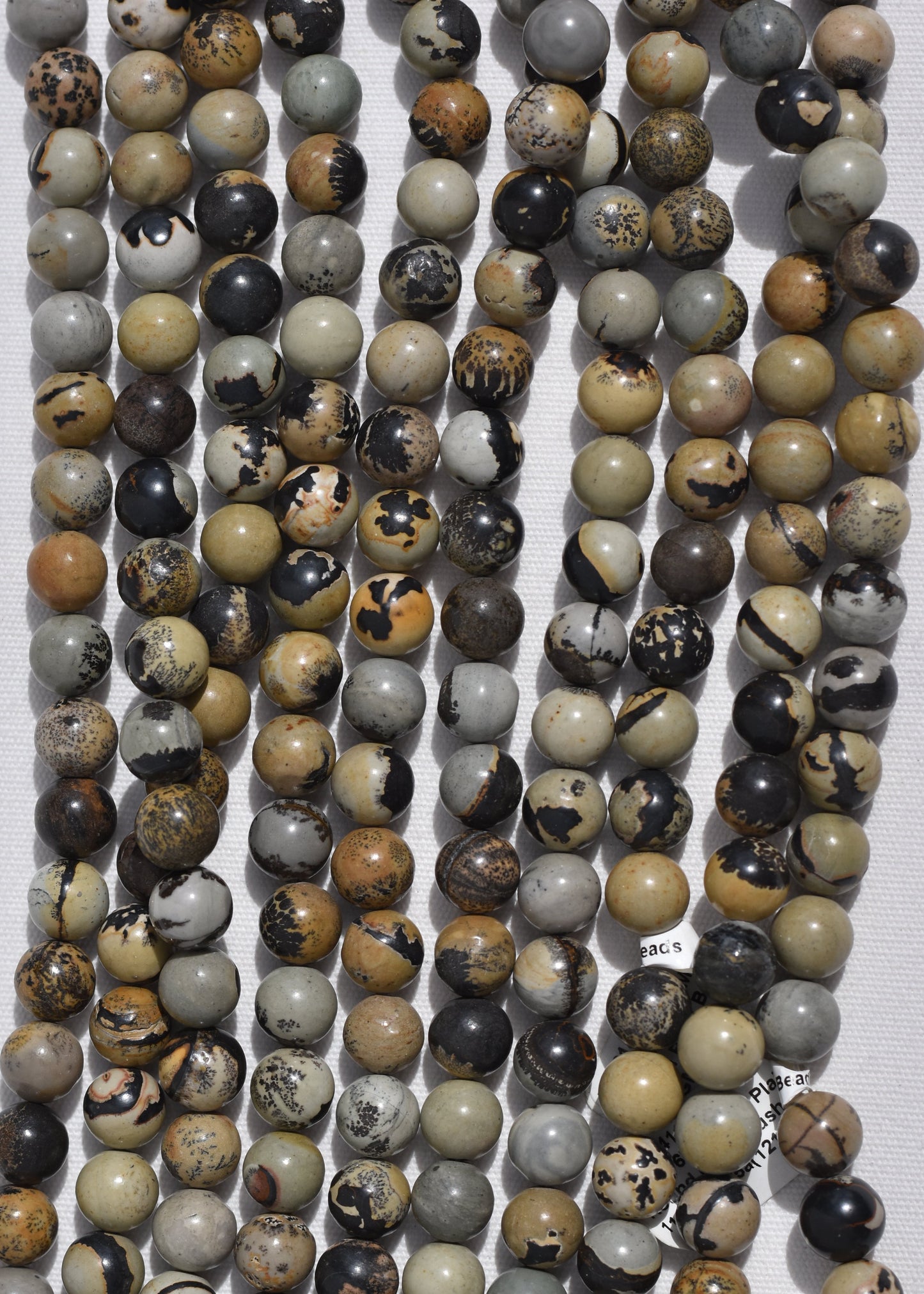 Crafting supplies such as Paint Brush Jasper beads available at wholesale and retail prices, only at our crystal shop in San Diego!