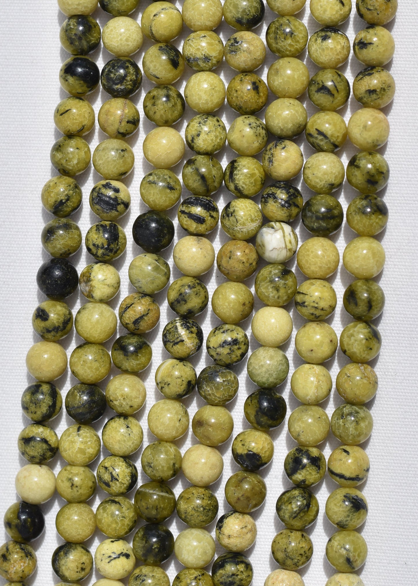 Crafting supplies such as Yellow Turtle Jasper beads available at wholesale and retail prices, only at our crystal shop in San Diego!