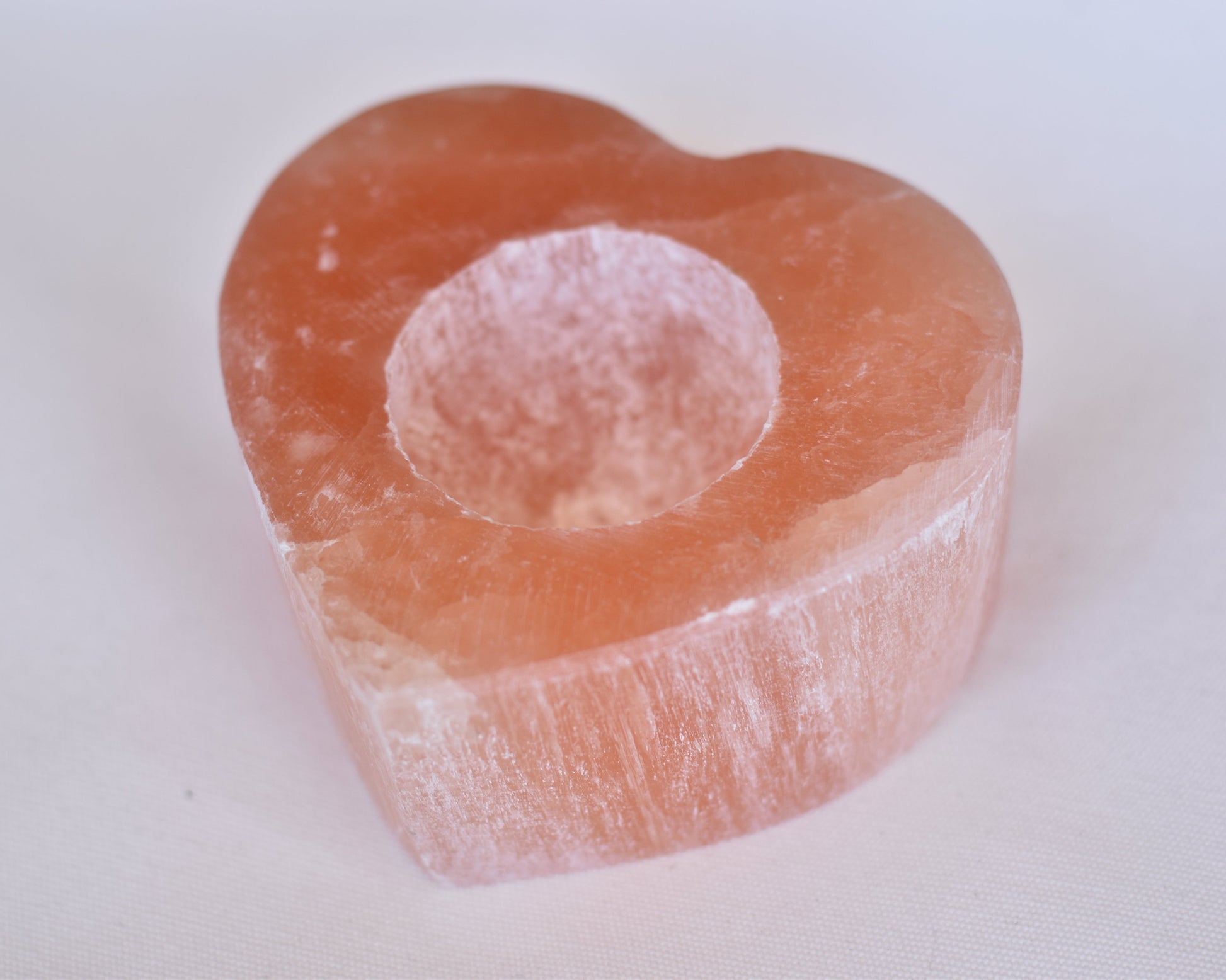 Check out our crystal shop in San Diego with Selenite decor such as lamps, bowls, candle holders and more! 
At Pacific Beads, we carry crystals in a wide variety of forms. Find Selenite geodes, Selenite housewares, Selenite carvings, and designer Selenite jewelry so that you can enjoy its healing properties in the way that best suits you and your lifestyle. The best part? You can shop crystals wholesale, meaning there is always something within your budget!