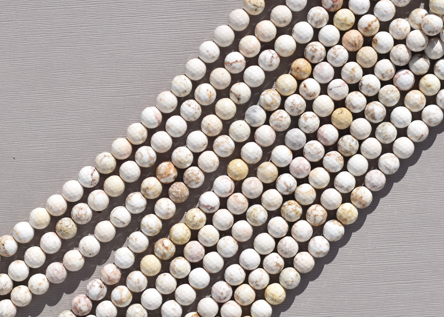 Crafting supplies such as White Magnesite Beads available at wholesale and retail prices, only at our crystal shop in San Diego!
