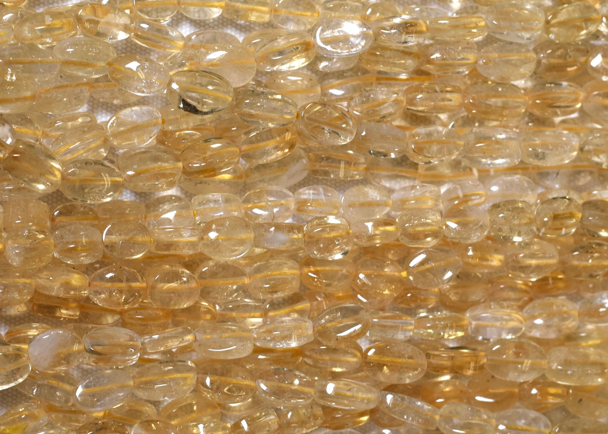 Crafting supplies such as Citrine Beads available at wholesale and retail prices, only at our crystal shop in San Diego!