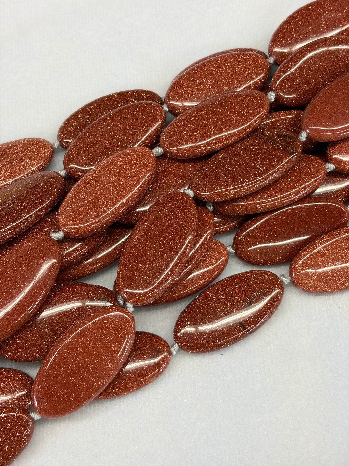 Oval Brown Goldstone Beads