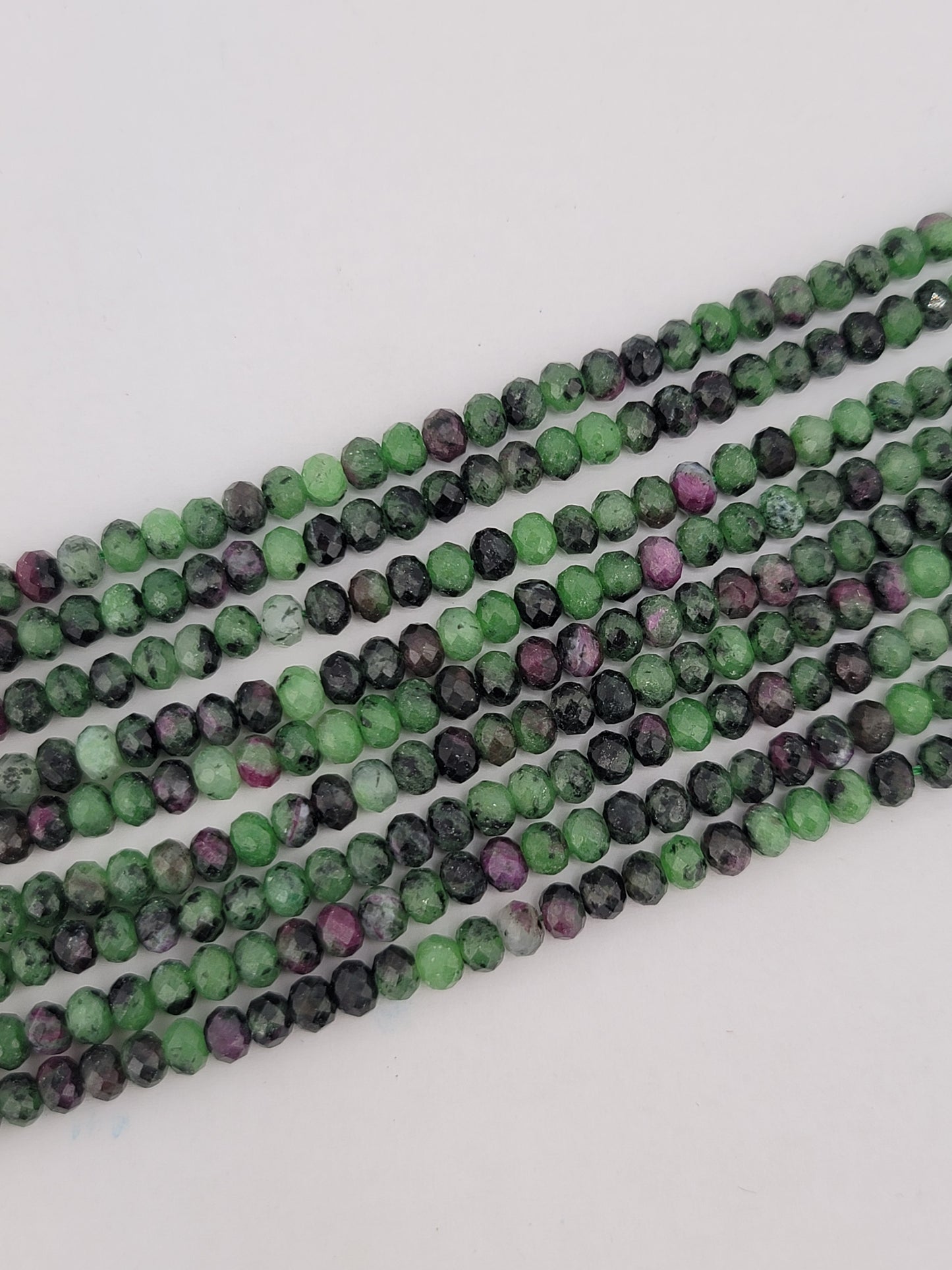 Faceted Ruby Zoisite Rondelle Beads