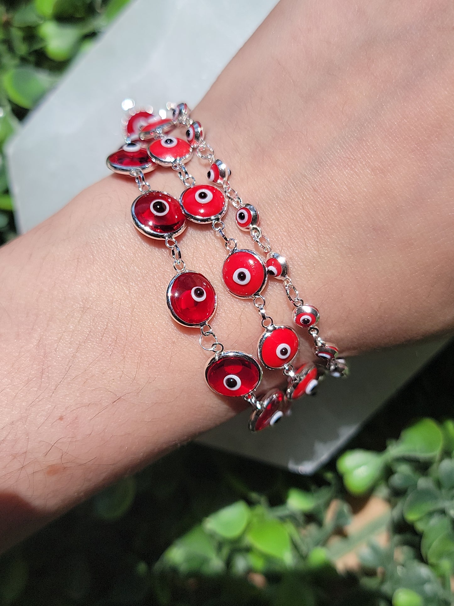 Sterling silver evil eye bracelet available at wholesale and retail prices, only at our crystal shop in San Diego!