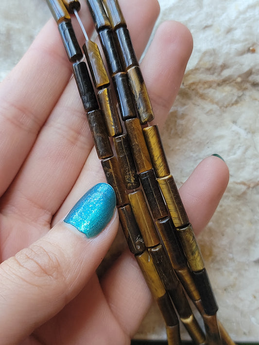 Crafting supplies such as tiger eye tube beads available at wholesale and retail prices, only at our crystal shop in San Diego!