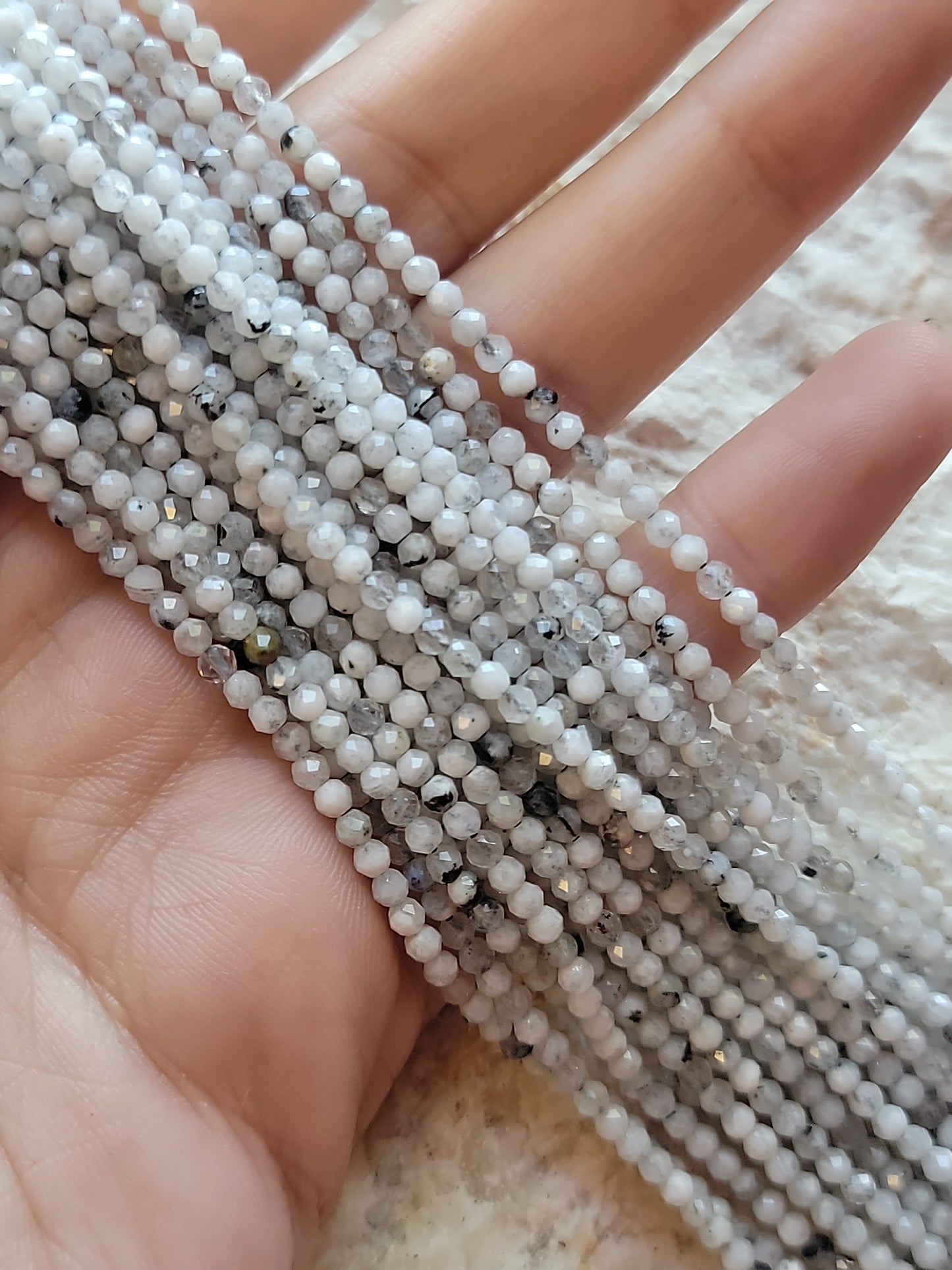 Crafting supplies such as faceted dendritic opal beads available at wholesale and retail prices, only at our crystal shop in San Diego!