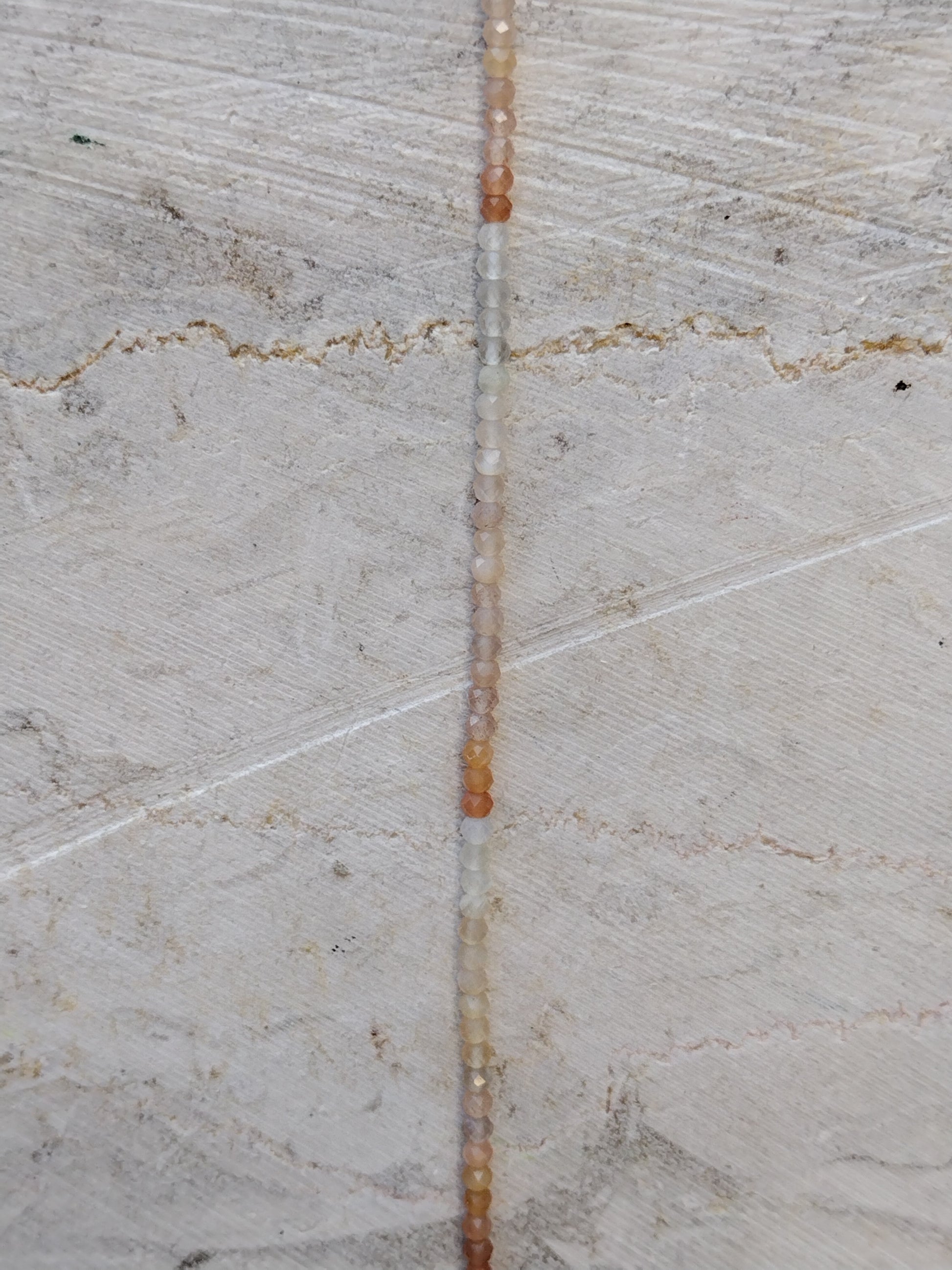 Crafting supplies such as moonstone beads available at wholesale and retail prices, only at our crystal shop in San Diego!