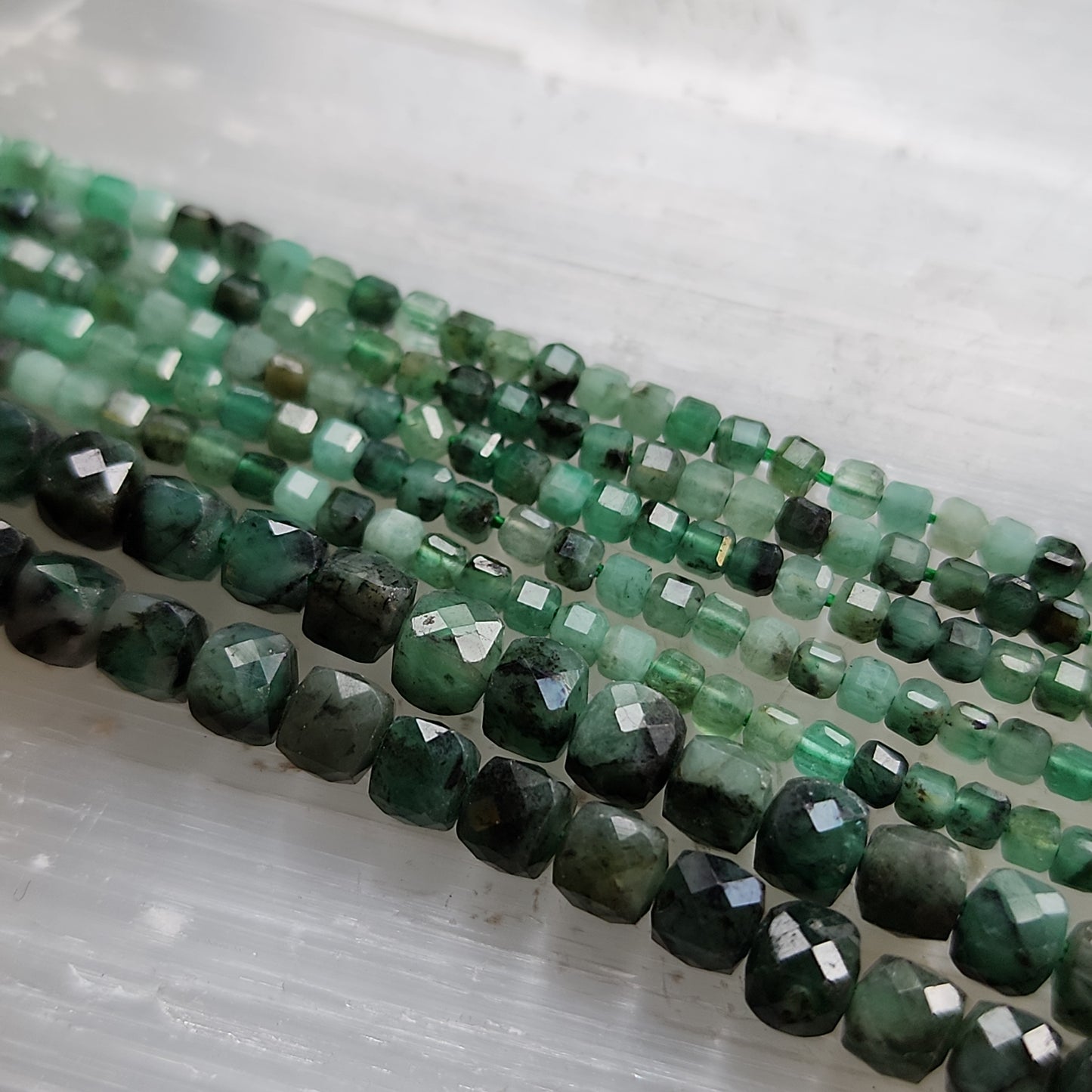 Crafting supplies such as emerald beads available at wholesale and retail prices, only at our crystal shop in San Diego!