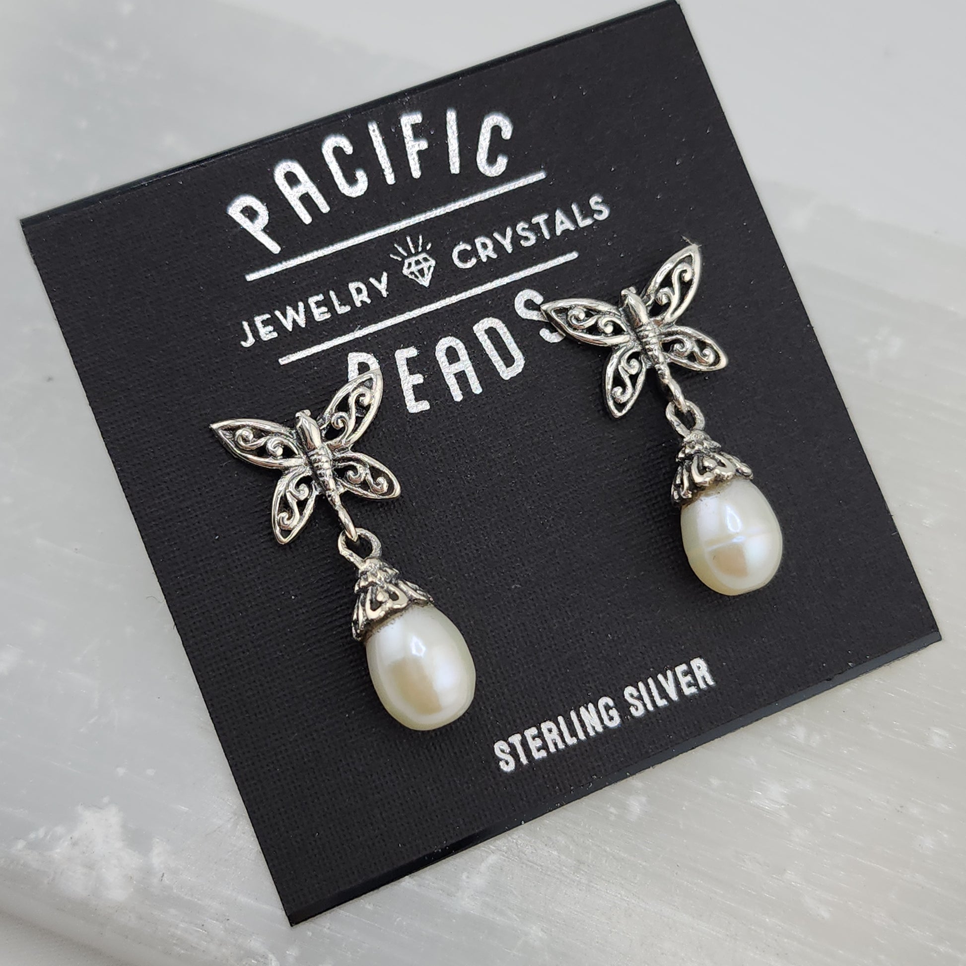 Pearl butterfly earrings in Sterling Silver