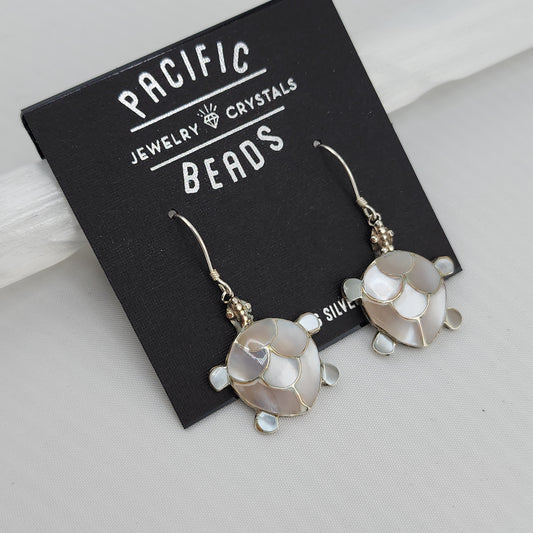 Sterling silver mother of pearl turtle earrings available at wholesale and retail prices, only at our crystal shop in San Diego!