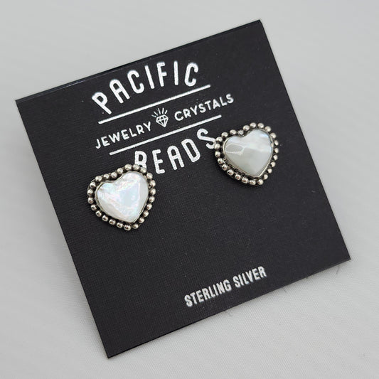 Sterling silver mother of pearl heart stud earrings available at wholesale and retail prices, only at our crystal shop in San Diego!