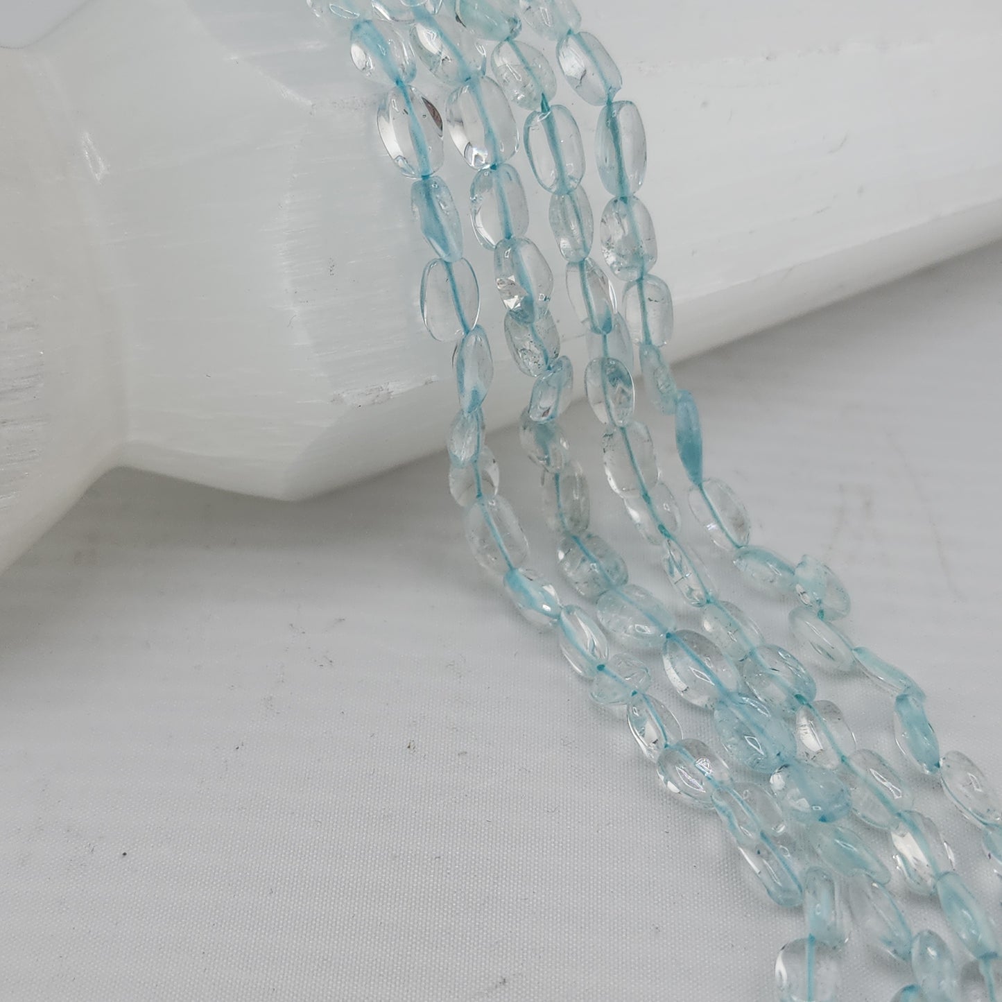 Crafting supplies such as aquamarine beads available at wholesale and retail prices, only at our crystal shop in San Diego!