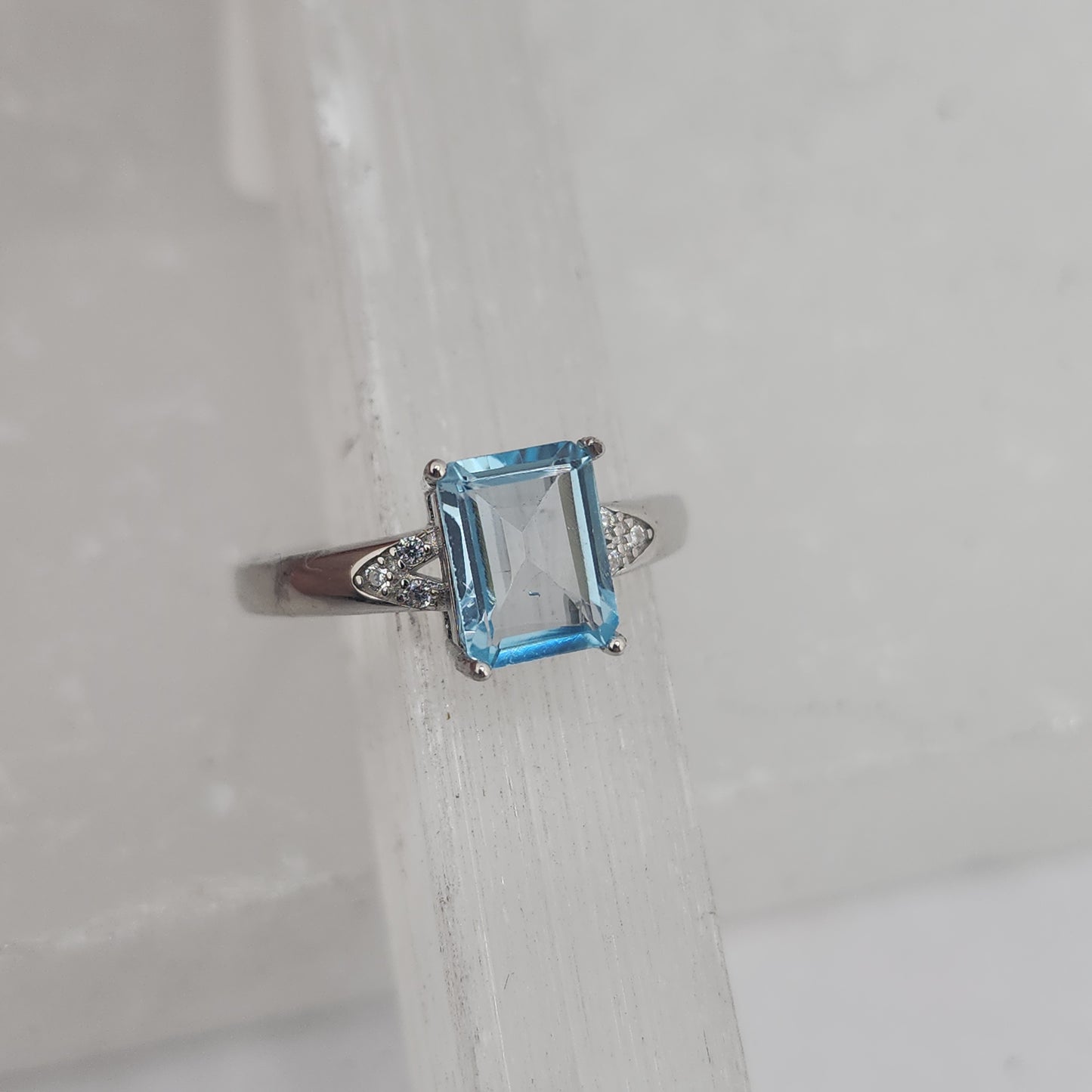 S.S. Faceted Blue Topaz and Zircon Adjustable Rings