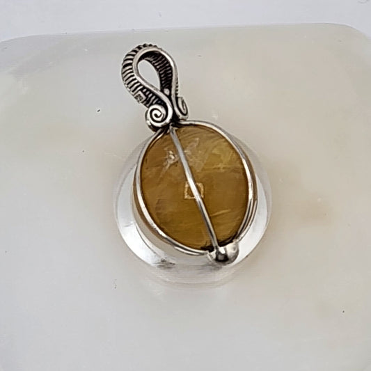 Citrine sphere pendant wrapped in sterling silver wire