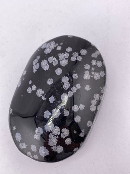 Snowflake obsidian palmstones available at wholesale and retail prices, only at our crystal shop in San Diego!