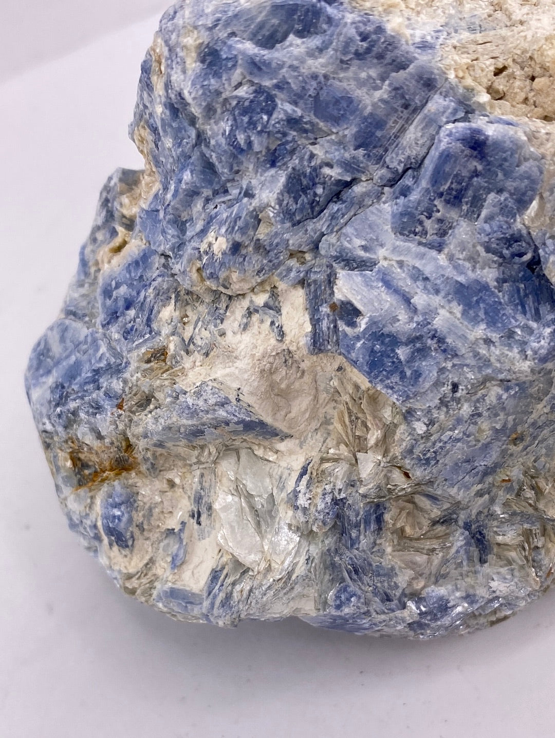 Raw blue kyanite available at wholesale and retail prices, only at our crystal shop in San Diego!