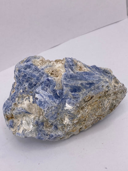 Raw blue kyanite available at wholesale and retail prices, only at our crystal shop in San Diego!